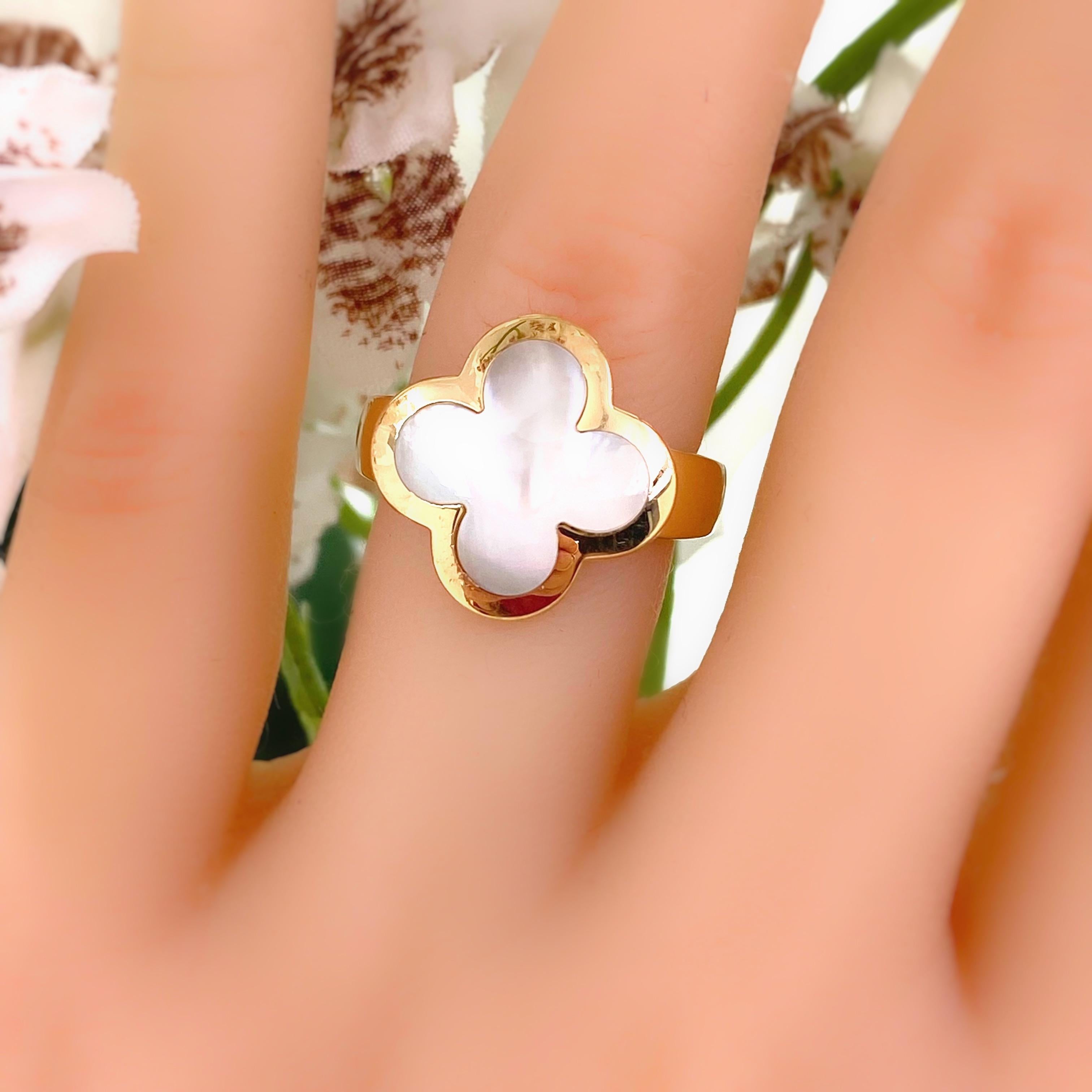 Van Cleef & Arpels Pure Alhambra Ring
Style:  Pure Alhambra Ring
Ref. number:  VCA RA 35900
Metal:  18kt Yellow Gold
Size:  US 5 / French 50
Gemstone:  Mother of Pearl
Width:  17.5 MM
Hallmark:  VCA 750 50 CL7****
Includes:  COA - ELEGANT RING