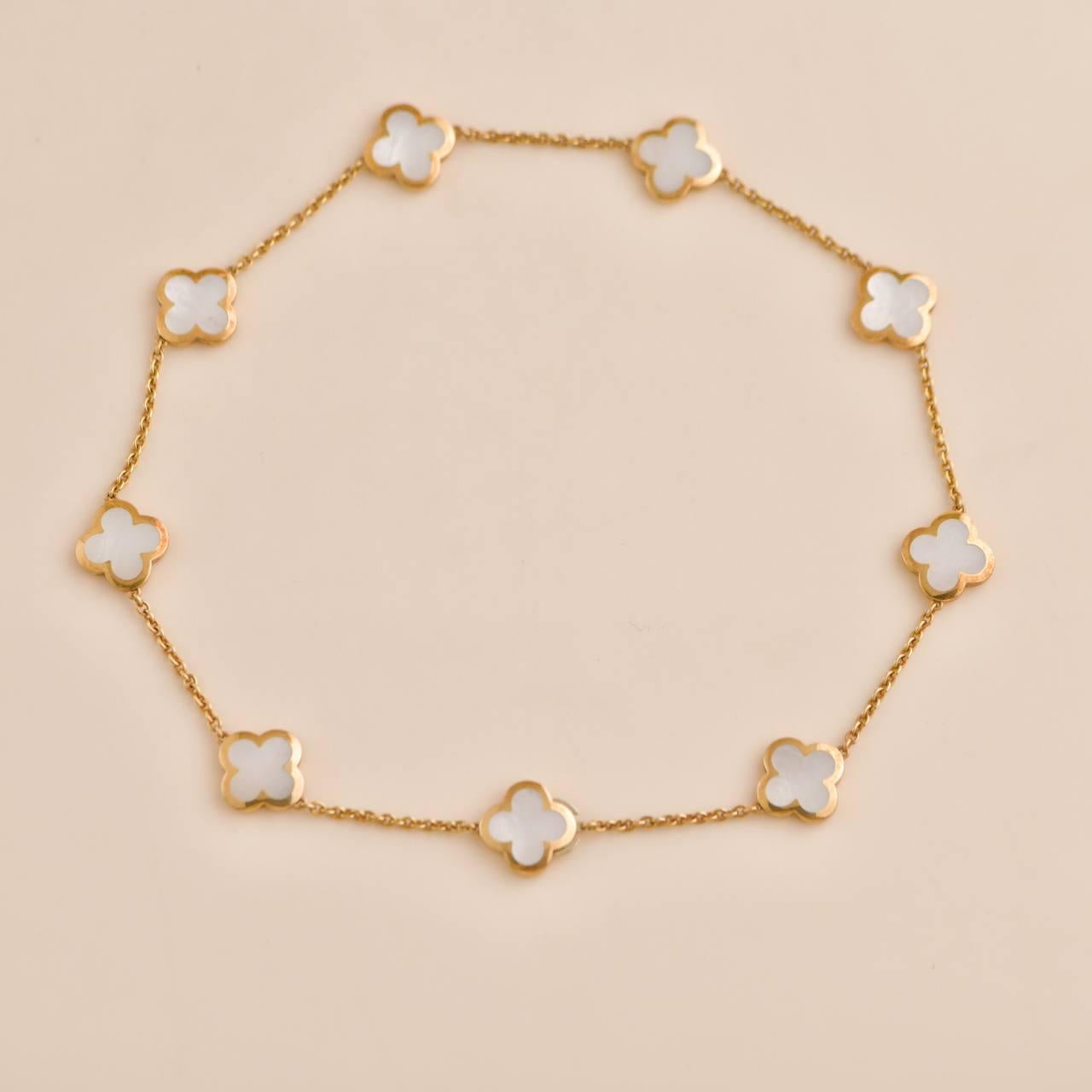 Women's or Men's Van Cleef & Arpels Pure Alhambra Mother Of Pearl 9 Motif Yellow Gold Necklace
