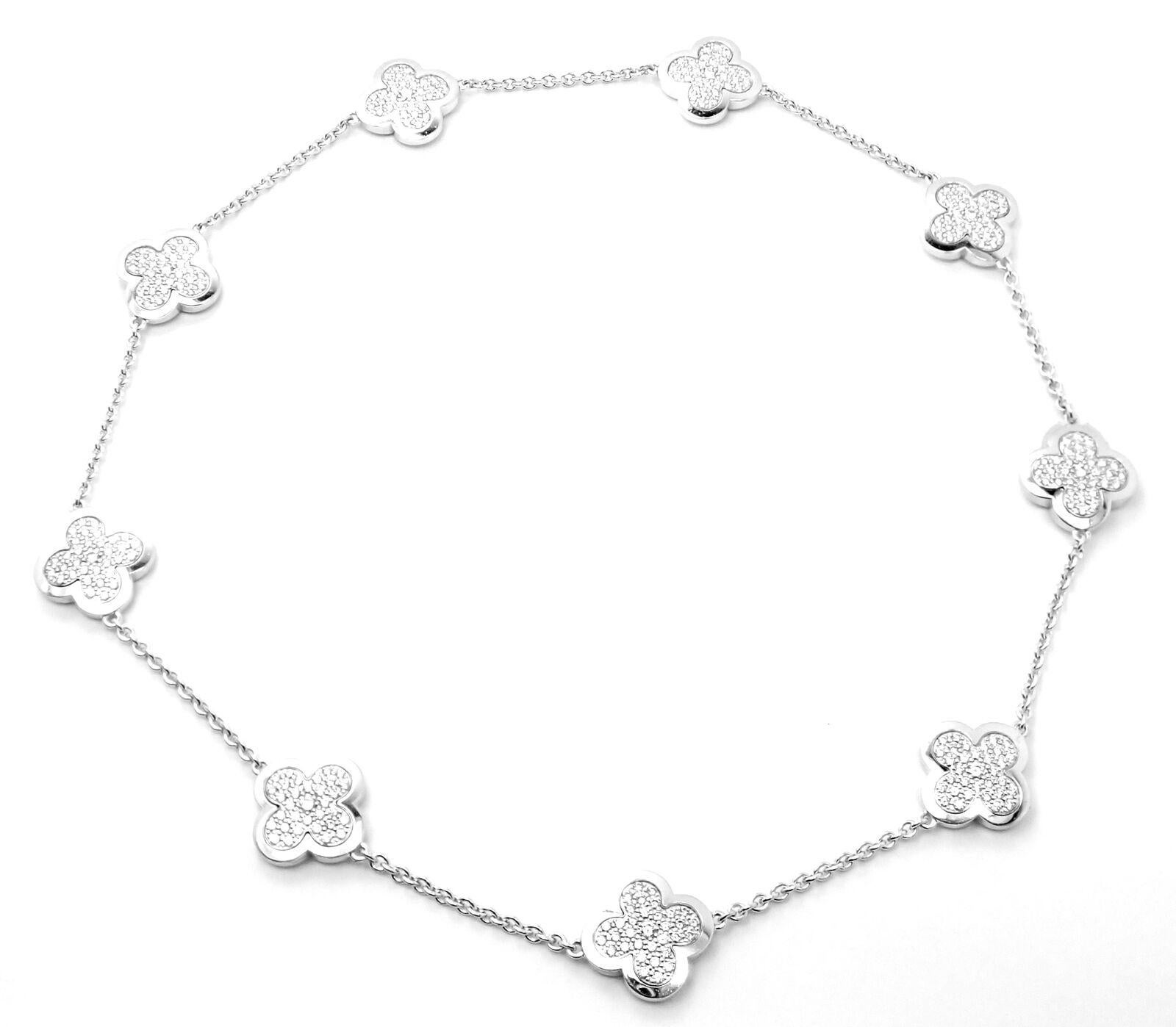 18k White Gold Pure Alhambra 9 Motifs Diamond Necklace by Van Cleef & Arpels.
With 9 diamond Alhambras 16mm each VVS1 clarity, E color total weight approximately 3.50ct
Details:
Length: 16.25