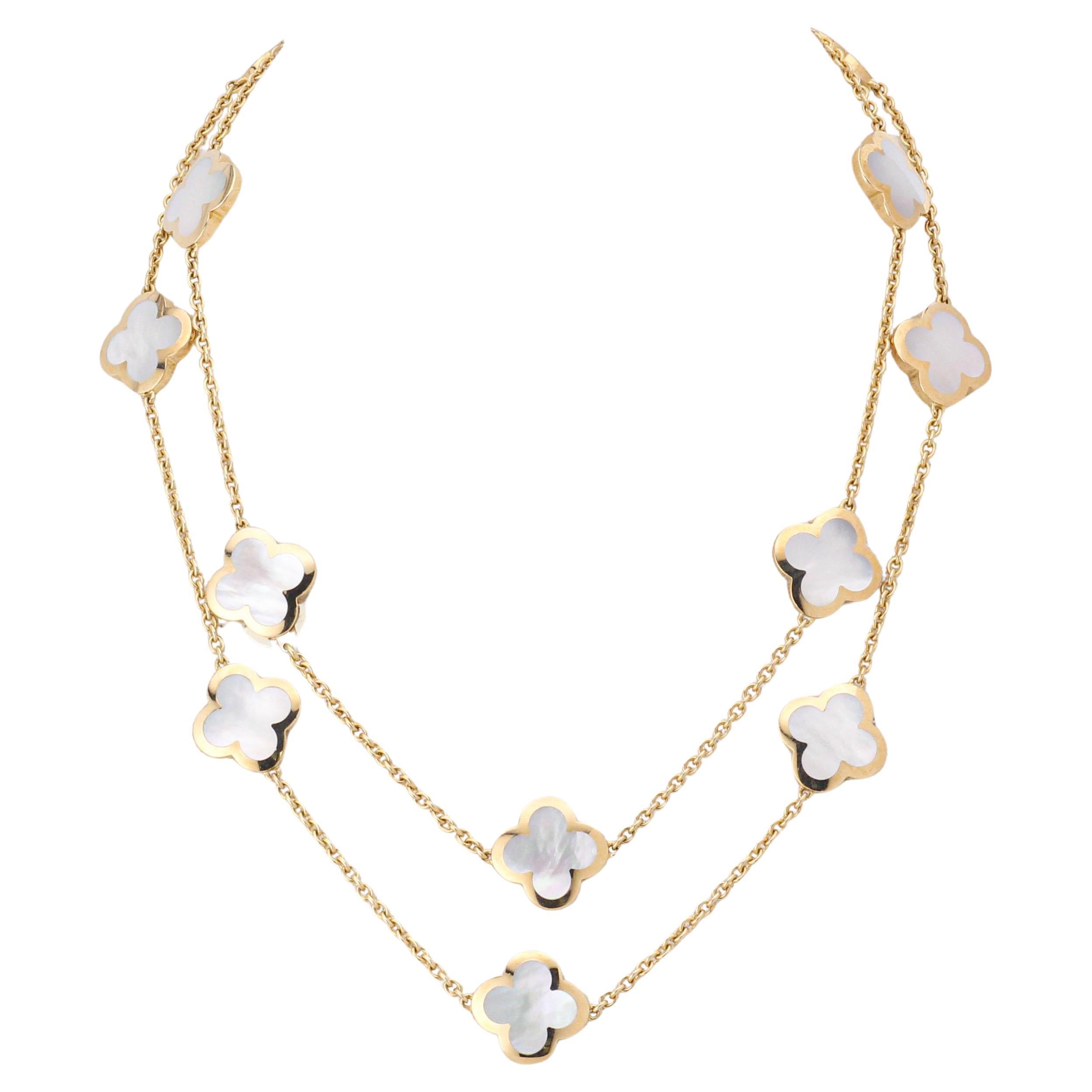 Van Cleef
Arpels Pure Alhambra White MOP 18K Yellow Gold 14 Motif Necklace BP