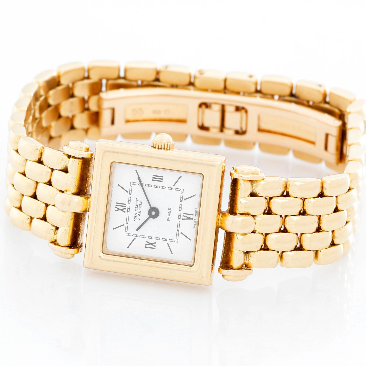 Van Cleef & Arpels Quartz Yellow Gold Watch Ref. 122664 - Quartz. 18K Yellow gold case ( 20 mm ). White dial with Roman and stick hour markers. 18K Yellow gold double deployant.  Will fit up to a 6 1/2 inch wrist. Pre-owned with Van Cleef & Arpels