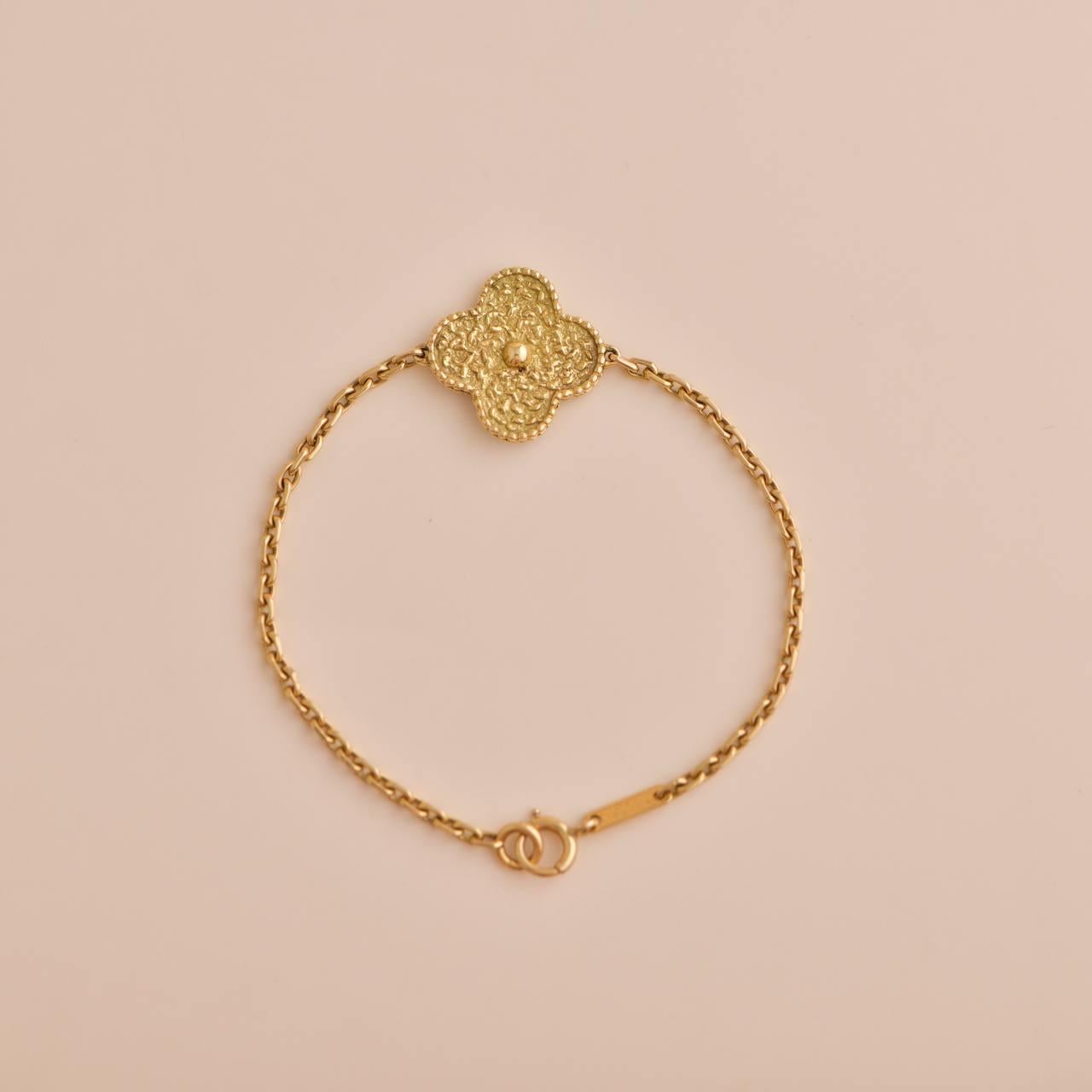 van cleef hammered gold bracelet