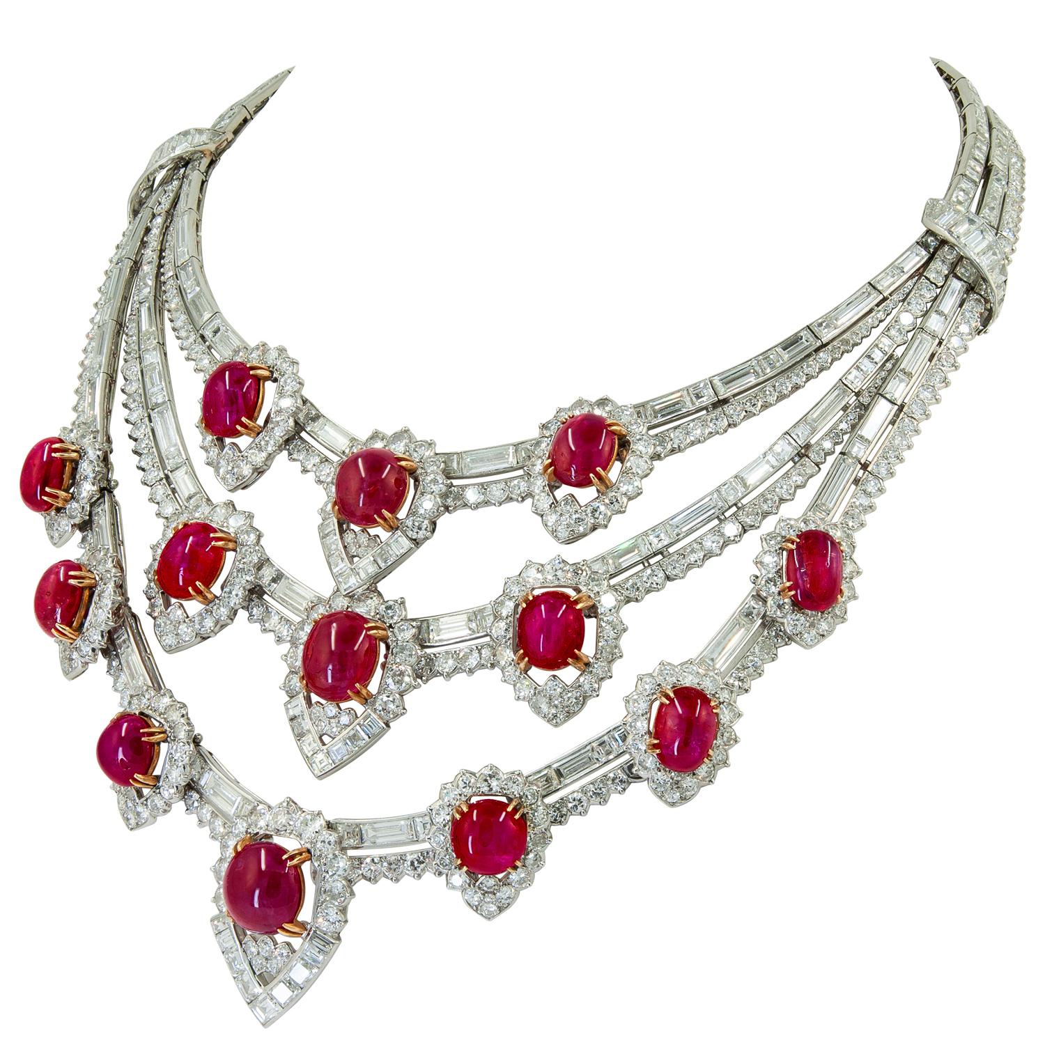 VAN CLEEF & ARPELS Retro Ruby, Diamond Necklace.
An 18k yellow gold and platinum necklace, set with oval and cabochon rubies and diamonds, signed Van Cleef & Arpels.
Dimensions approx. 37.5 cm ( 14.75 inches)
Gross weight approx. 208.7 grams
Stamped