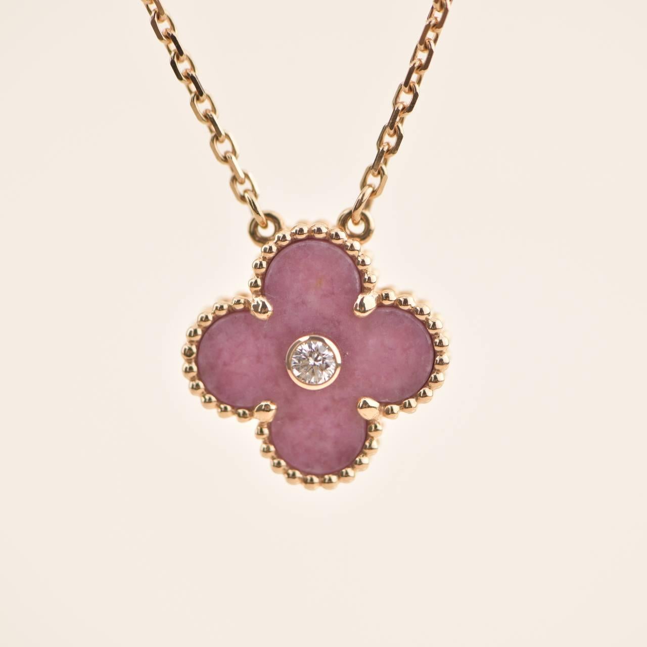 Van Cleef & Arpels Rhodonite Vintage Alhambra Diamond 2021 Holiday Pendant In Excellent Condition In Banbury, GB