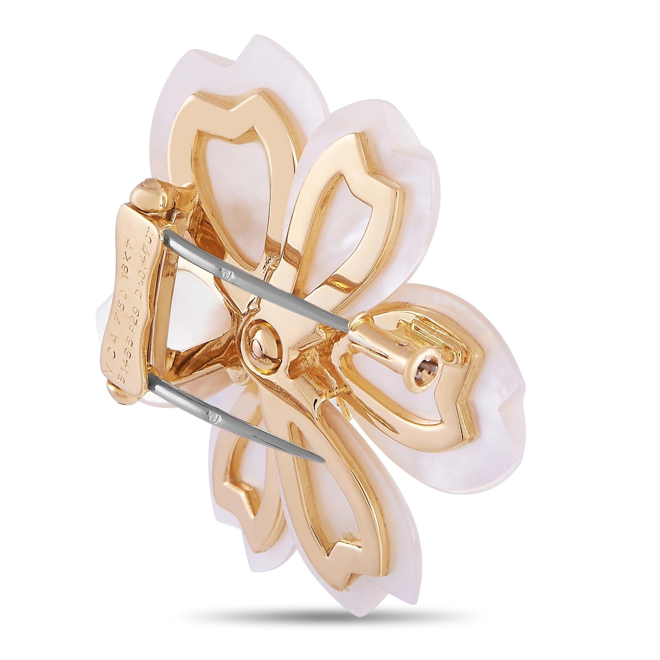 This breathtaking floral brooch from the Van Cleef & Arpels Rose de Noel collection instantly adds elegance and luxury to any ensemble. Mother of Pearl “petals” look lovely against the subtle 18K yellow gold setting. But it’s the 0.46 carats of