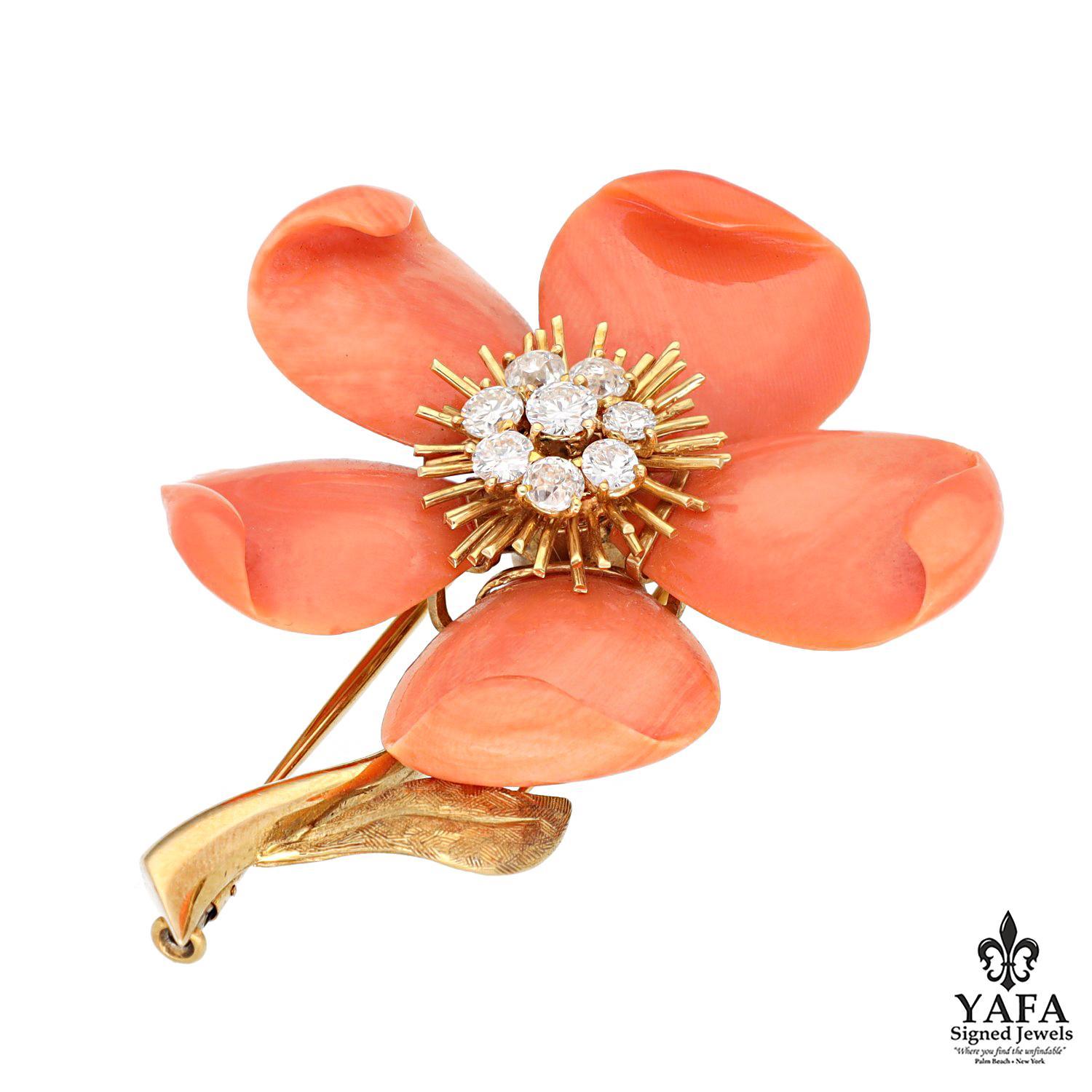 These Christmas roses, bloom in midwinter like promises of happiness. The brooch is handcrafted with 18K yellow gold, diamonds, orange angel skin coral crafted into pedals, and round brilliant diamonds radiating from the central focus point.

Circa