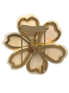 Van Cleef & Arpels Broche à pince rose de Noël en or, diamants et corail