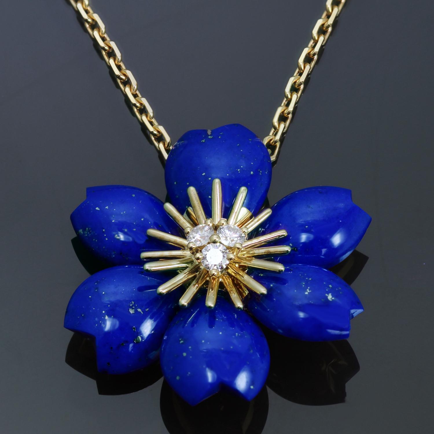 This stunning necklace from the iconic Rose De Noel collection by Van Cleef & Arpels is crafted in 18k yellow gold and features flower pendant composed of blue lapis lazuli petals and sparkling centers prong-set with brilliant-cut round D-E-F