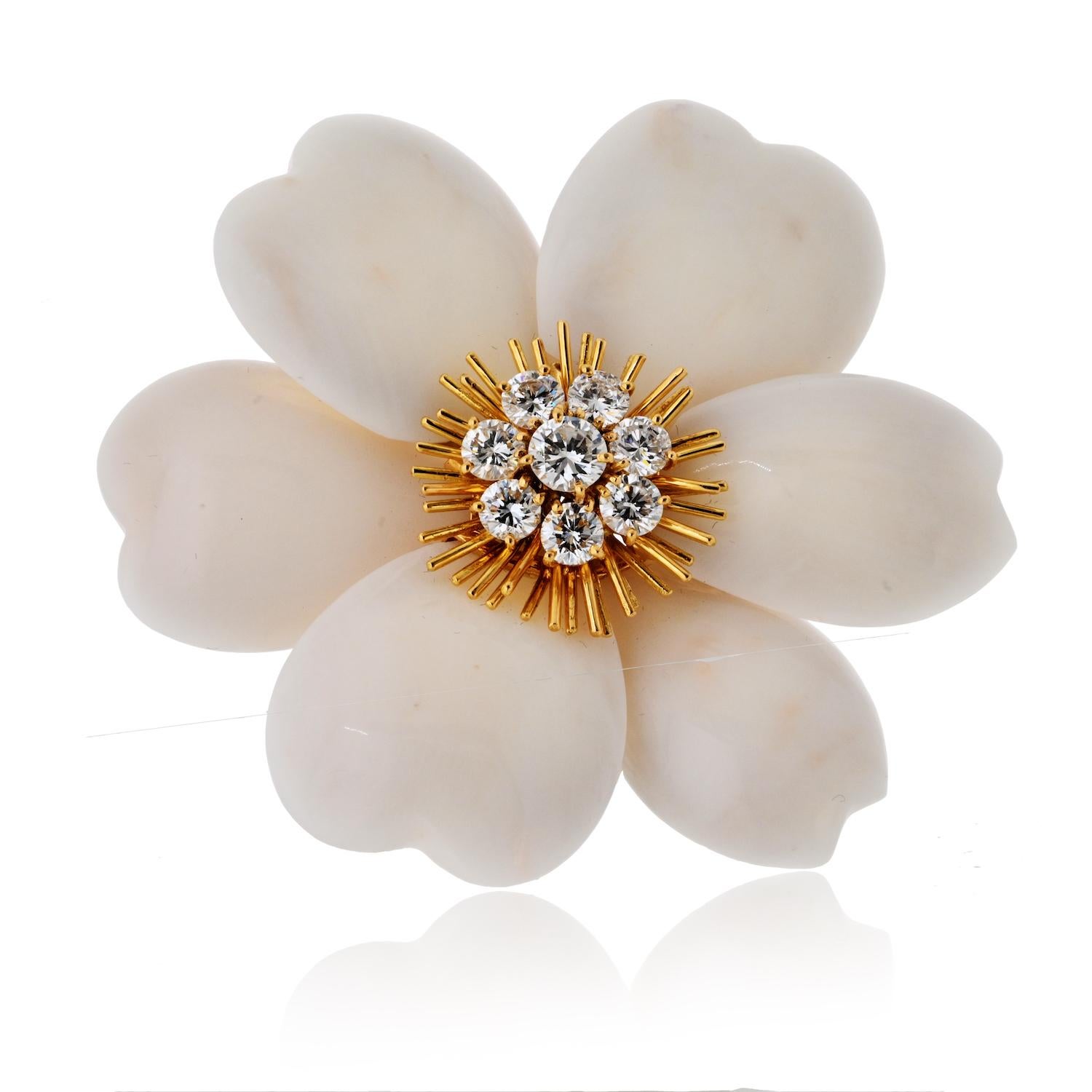 A breathtaking expression of floral elegance, this Van Cleef & Arpels Rose de Noël brooch is a rare and exquisite creation from one of the most celebrated maisons in fine jewelry. Expertly crafted in 18K yellow gold, this large model features soft,