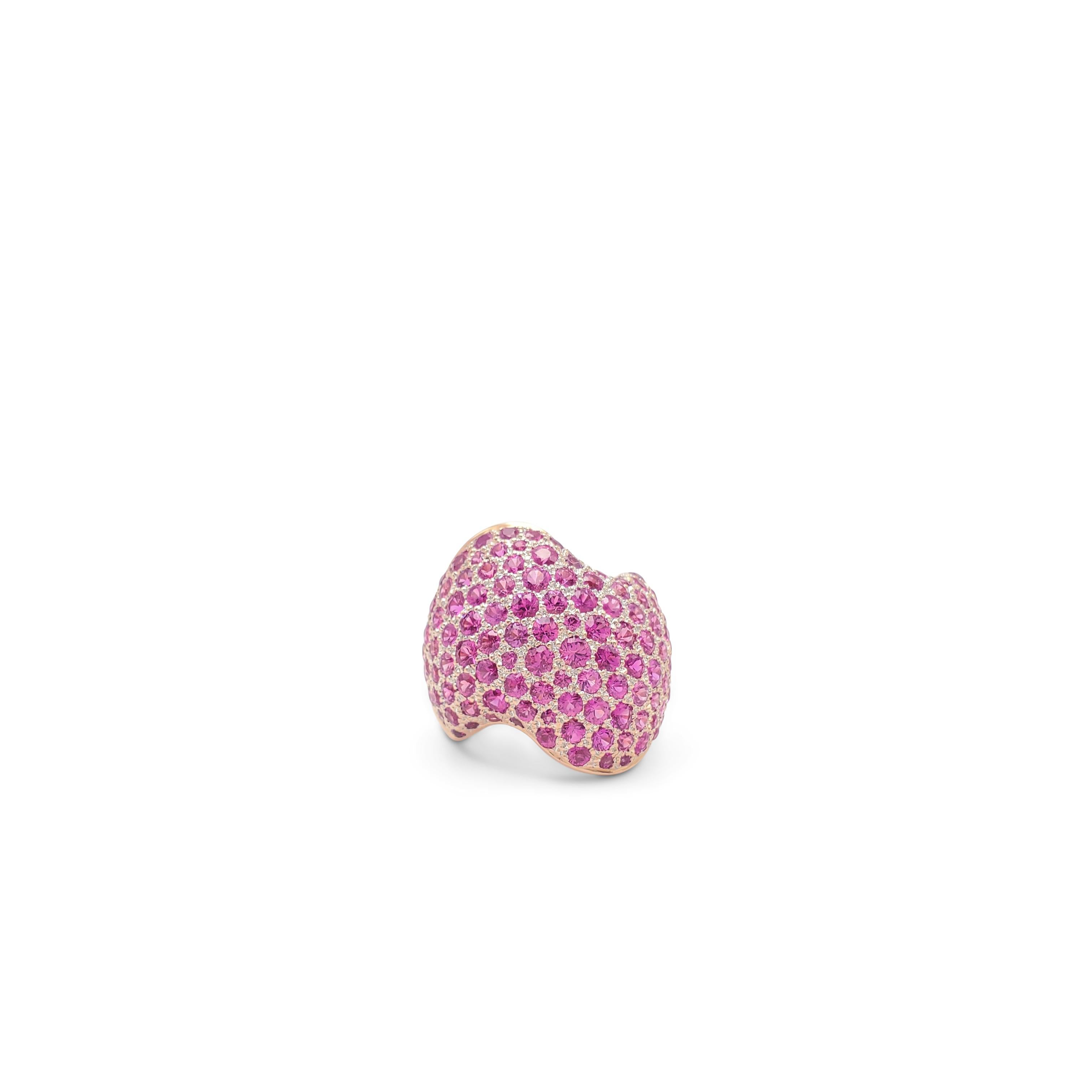 Authentic Van Cleef & Arpels ring crafted in 18 karat rose gold and set with an estimated 6.10 carats of pink sapphires. Signed VCA, 49, with serial numbers and hallmarks. Ring size 49 (US 4 3/4). The ring is presented with the original box and a