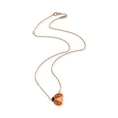 Van Cleef & Arpels Rose Gold Carnelian and Onyx Lucky Spring Pendant