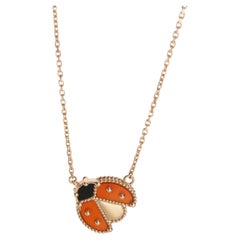 Van Cleef & Arpels Rose Gold Carnelian and Onyx Lucky Spring Pendant