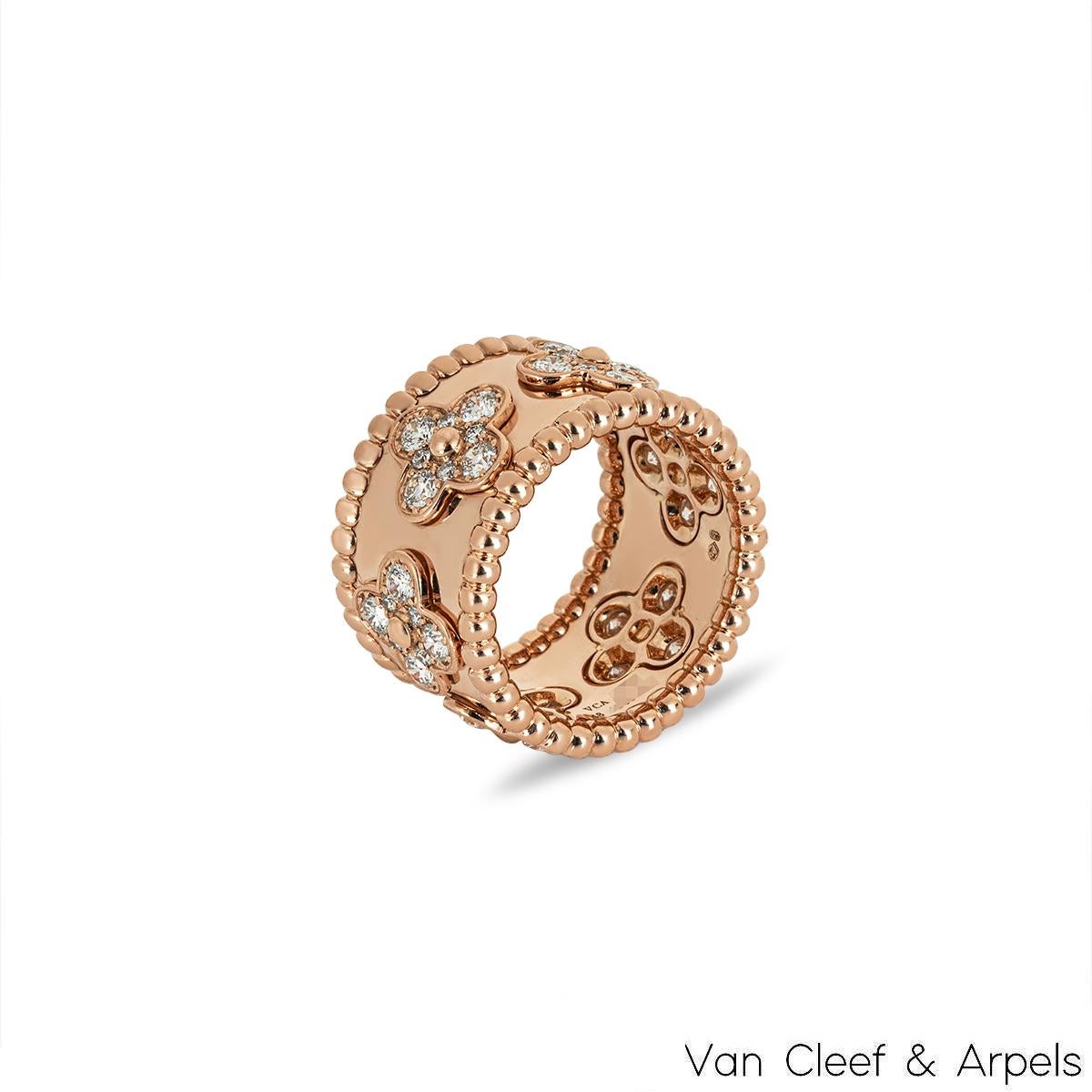 A beautiful 18k rose gold ring by Van Cleef & Arpels from the Perlée Clovers collection. The ring features 7 four leaf clover motifs, each set with 8 round brilliant cut diamonds. There are a total of 56 diamonds totaling approximately 1.49ct. The
