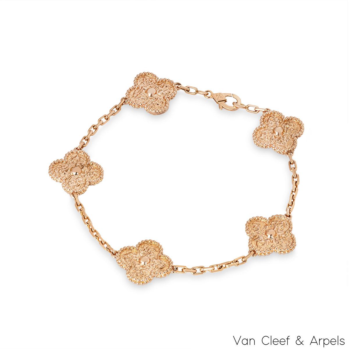 A beautiful 18k rose gold Vintage Alhambra necklace by Van Cleef & Arpels. The bracelet features 5 rose gold clover motifs with a beaded border. Measuring 7.5 inches in length, the bracelet finishes with a lobster hallmark clasp and has a gross