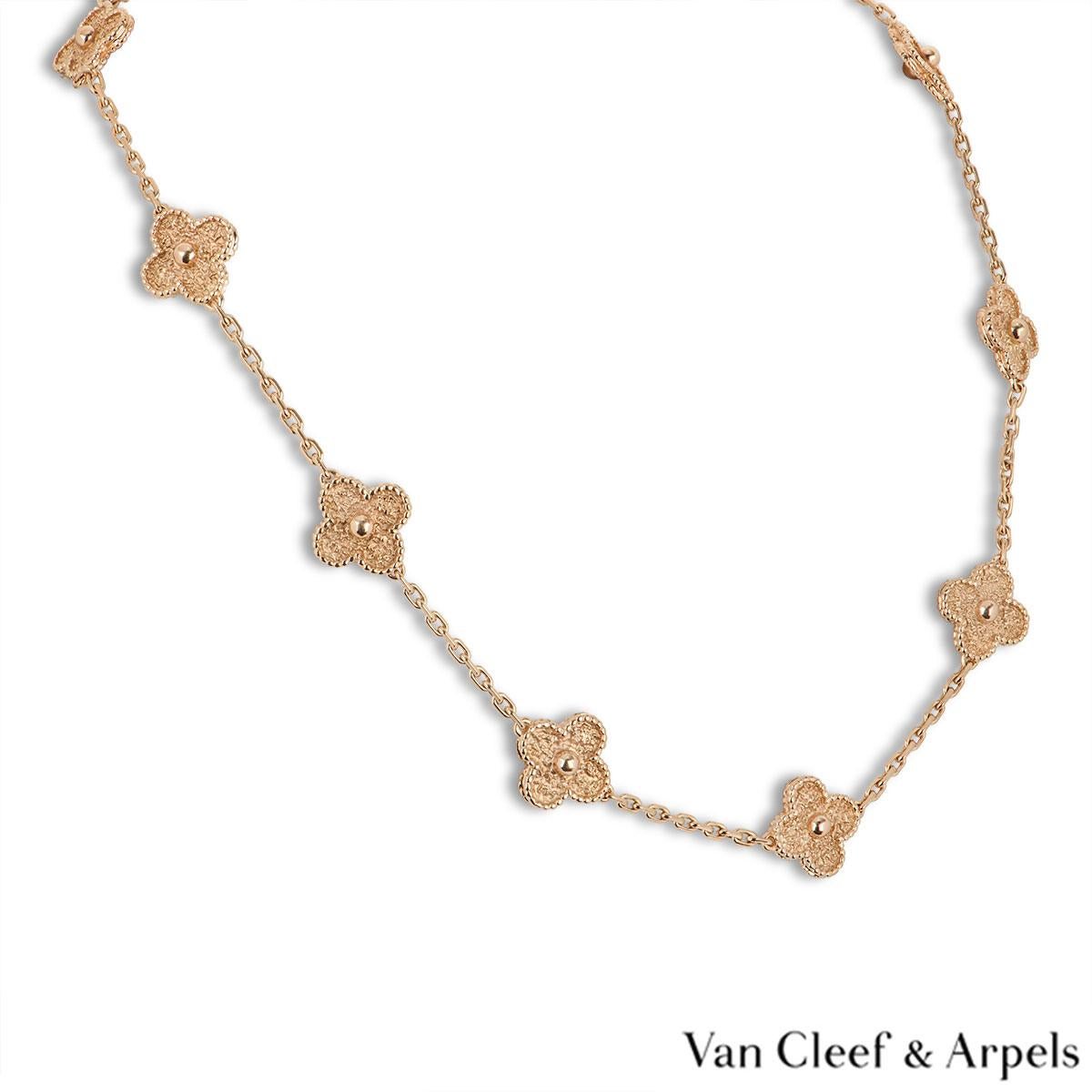 A beautiful 18k rose gold Vintage Alhambra necklace by Van Cleef & Arpels. The necklace features 10 rose gold clover motifs with a beaded border. The necklace measures 16 inches in length and is complete with a lobster clasp. The necklace has a