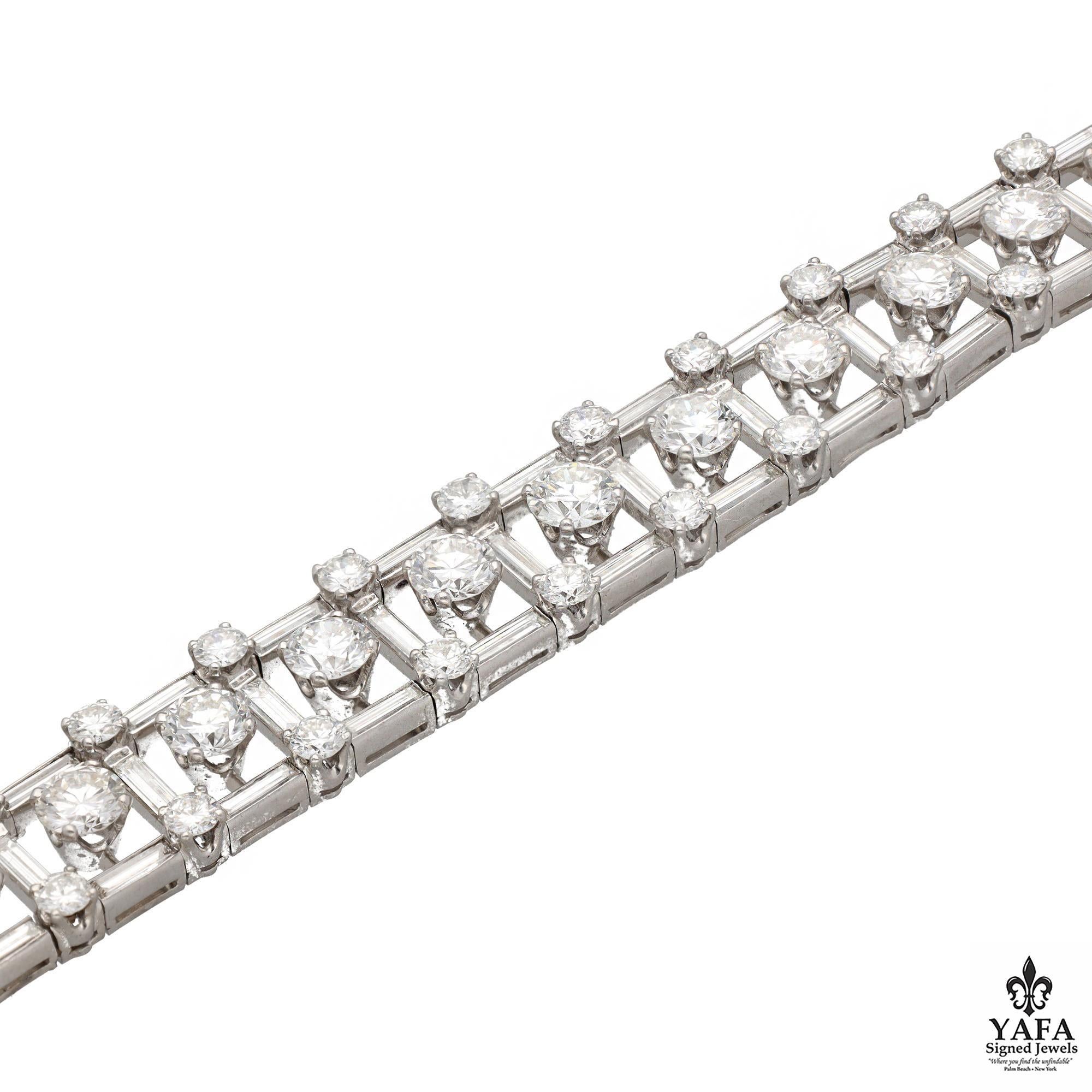 Van Cleef & Arpels Round Brilliant and Baguette Cut Bracelet Set in Platinum.
Stunningly Crafted - This Articulate Design Showcases Round Diamonds That Appear to Float Through the Center- Suspended Only by Their Shear Brilliance. This