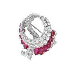 Van Cleef & Arpels ruby and diamond brooch in 18k white gold.