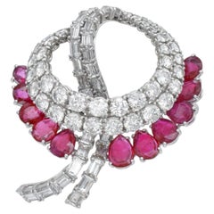Van Cleef & Arpels ruby and diamond brooch in 18k white gold.