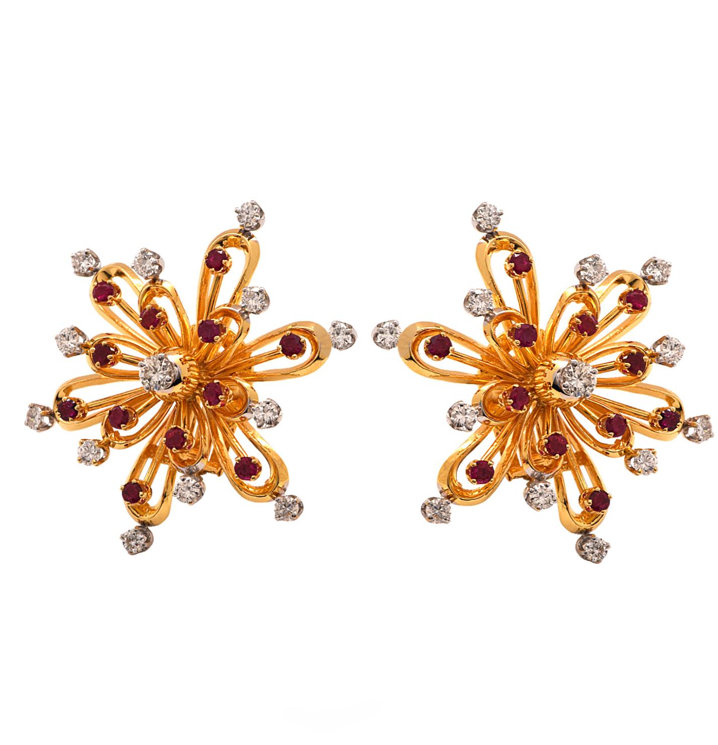 From the House of Van Cleef & Arpels, these exquisite earrings, finely crafted in 18 Karat yellow Gold, feature two delightful flowers embellished with 26 round brilliant cut diamonds weighing approximately 2.35 carats, G color, VS-SI clarity, and