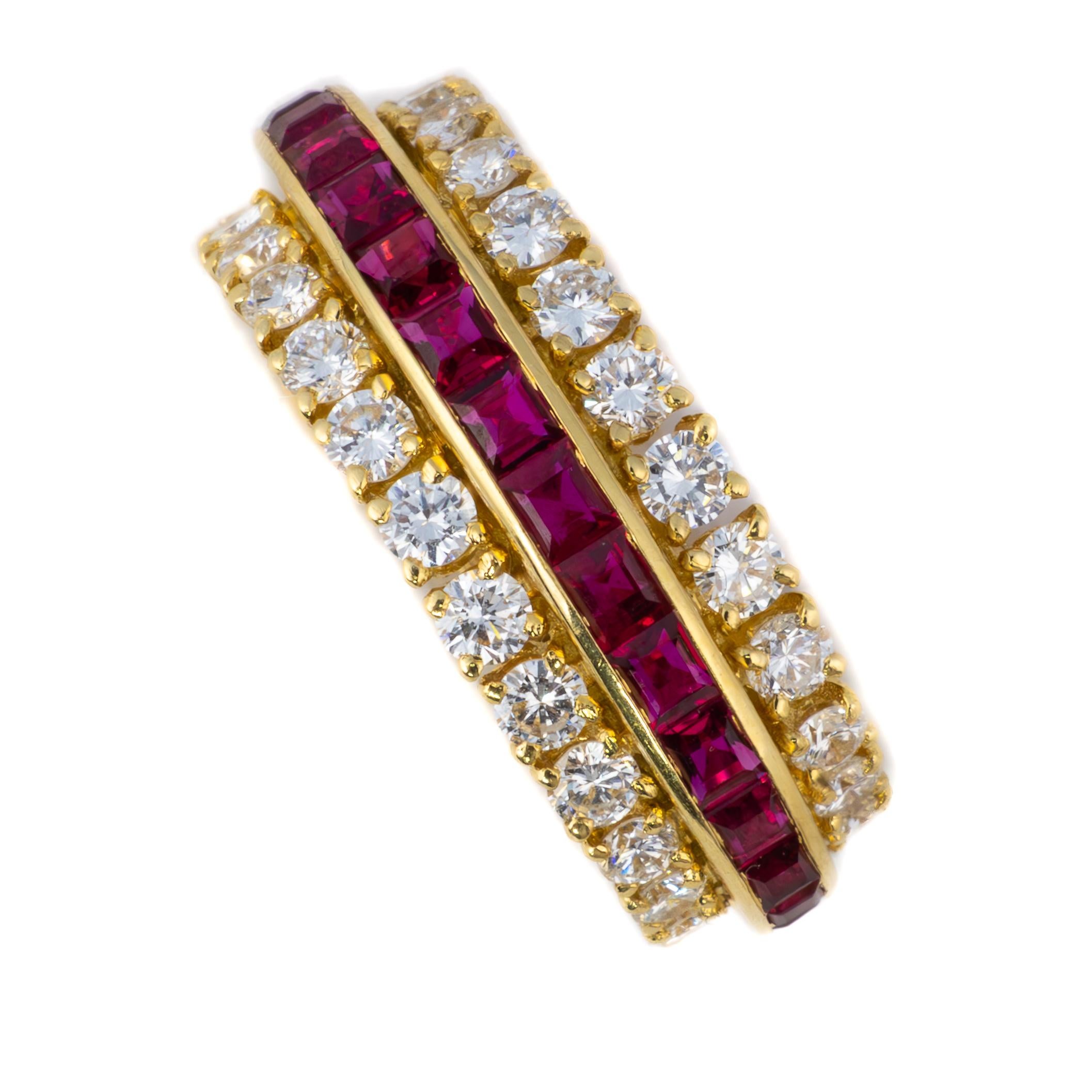 Van Cleef & Arpels Ruby and Diamond Gazelle Hoop Earrings

Description:
These elegant hoop earrings by Van Cleef & Arpels from 1986 showcase a central row of square-cut rubies bordered by two lines of brilliant-cut diamonds, creating a refined