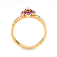 Van Cleef & Arpels, bague fleur en or jaune 18 carats avec rubis et diamants