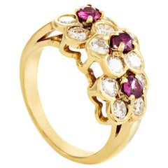 Van Cleef 
Arpels Ruby Diamond Gold Floral Band Ring
