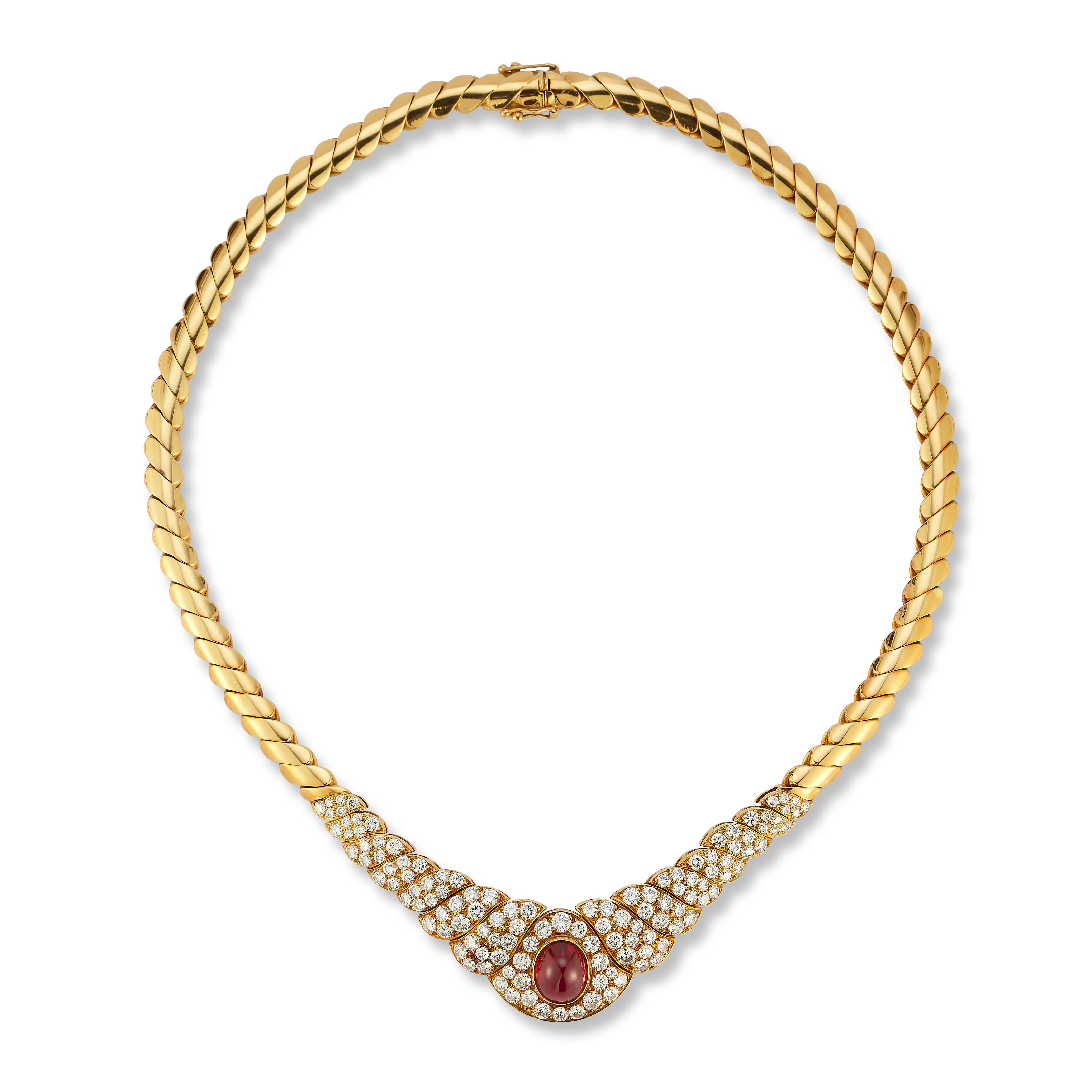 Van Cleef & Arpels Ruby & Diamond Necklace

An 18 karat yellow gold necklace set with 126 round cut diamonds and a very fine cabochon ruby

Signed VCA and numbered

Stamped 18K

Total Approximate Diamond Weight: 6.93 carats

Length: 16