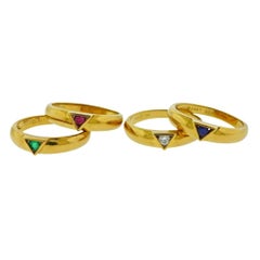 Van Cleef & Arpels Ruby Diamond Sapphire Emerald Gold Stackable Ring Set