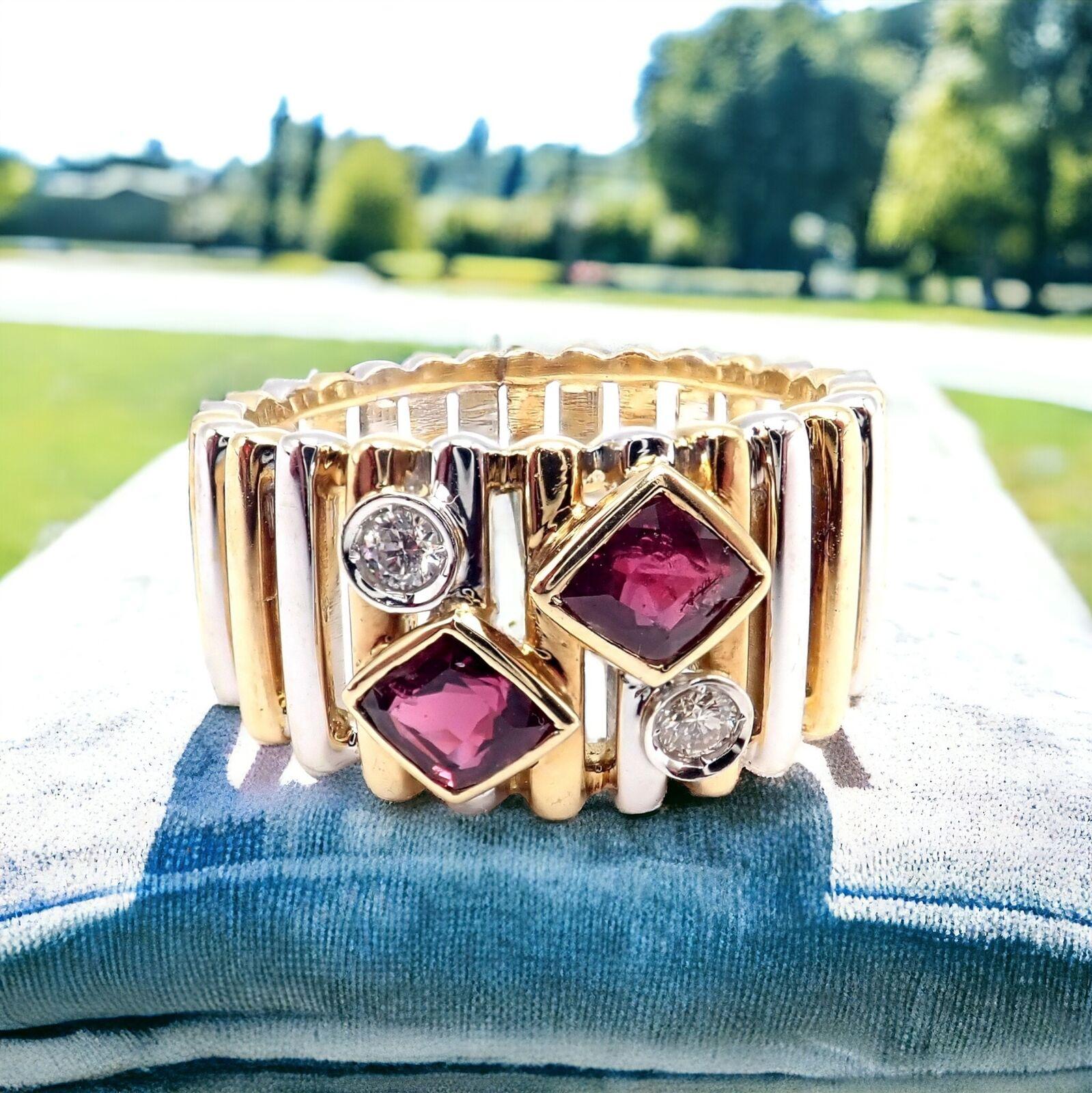 18k Yellow and White Gold Ruby and Diamond Ring by Van Cleef & Arpels. 
With 2 round brilliant cut diamonds, VVS1 Clarity, E Color and 2 princess cut Rubies.

This rare and authentic Van Cleef & Arpels ring combines 18k yellow and white gold,