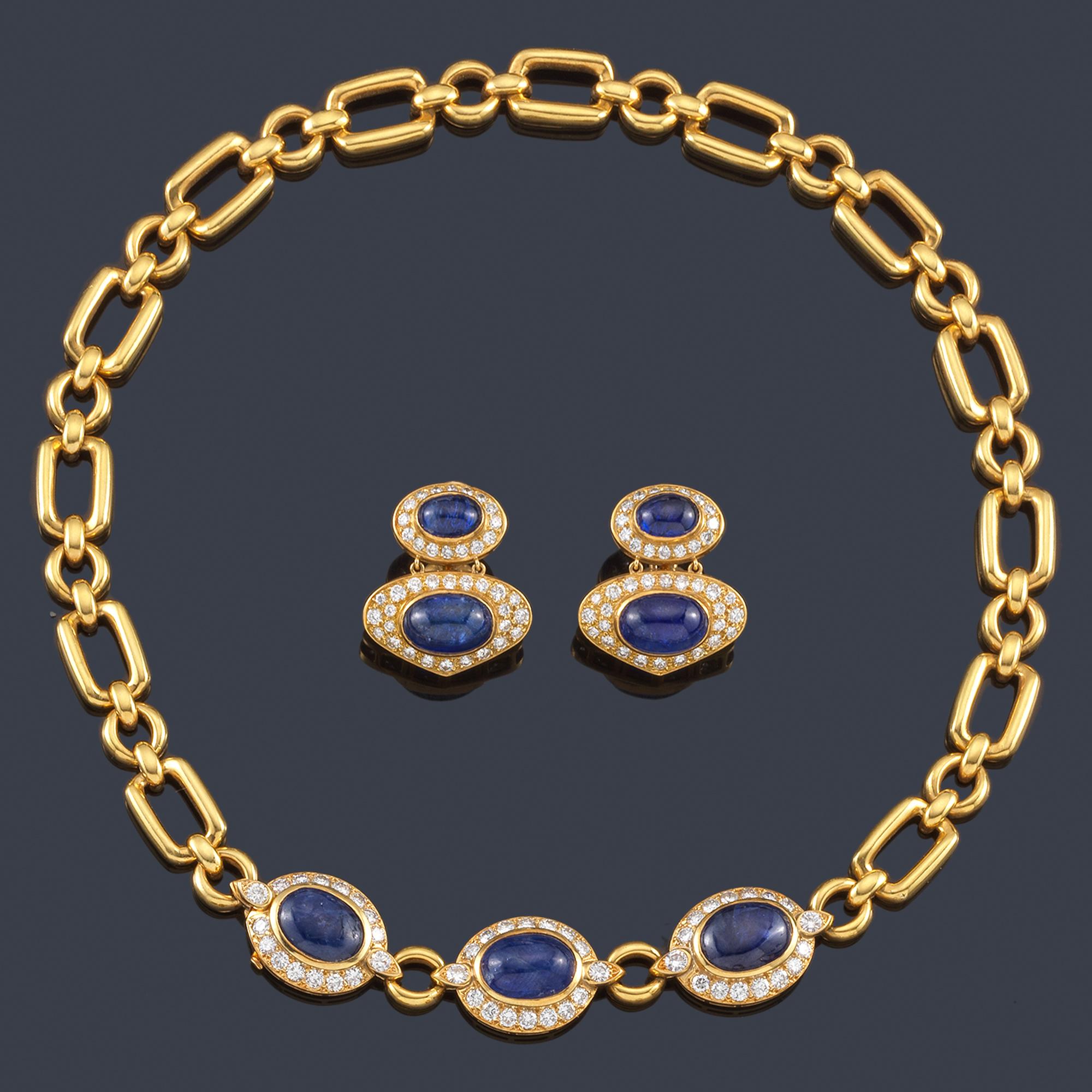 Van Cleef & Arpels Saphire Diamonds  and Yellow Gold Necklace and Earring Parure
Total Blue Saphire Cabouchon  19,17ct 
Diamonds  7,20ct  in 18k gold 
Length  17