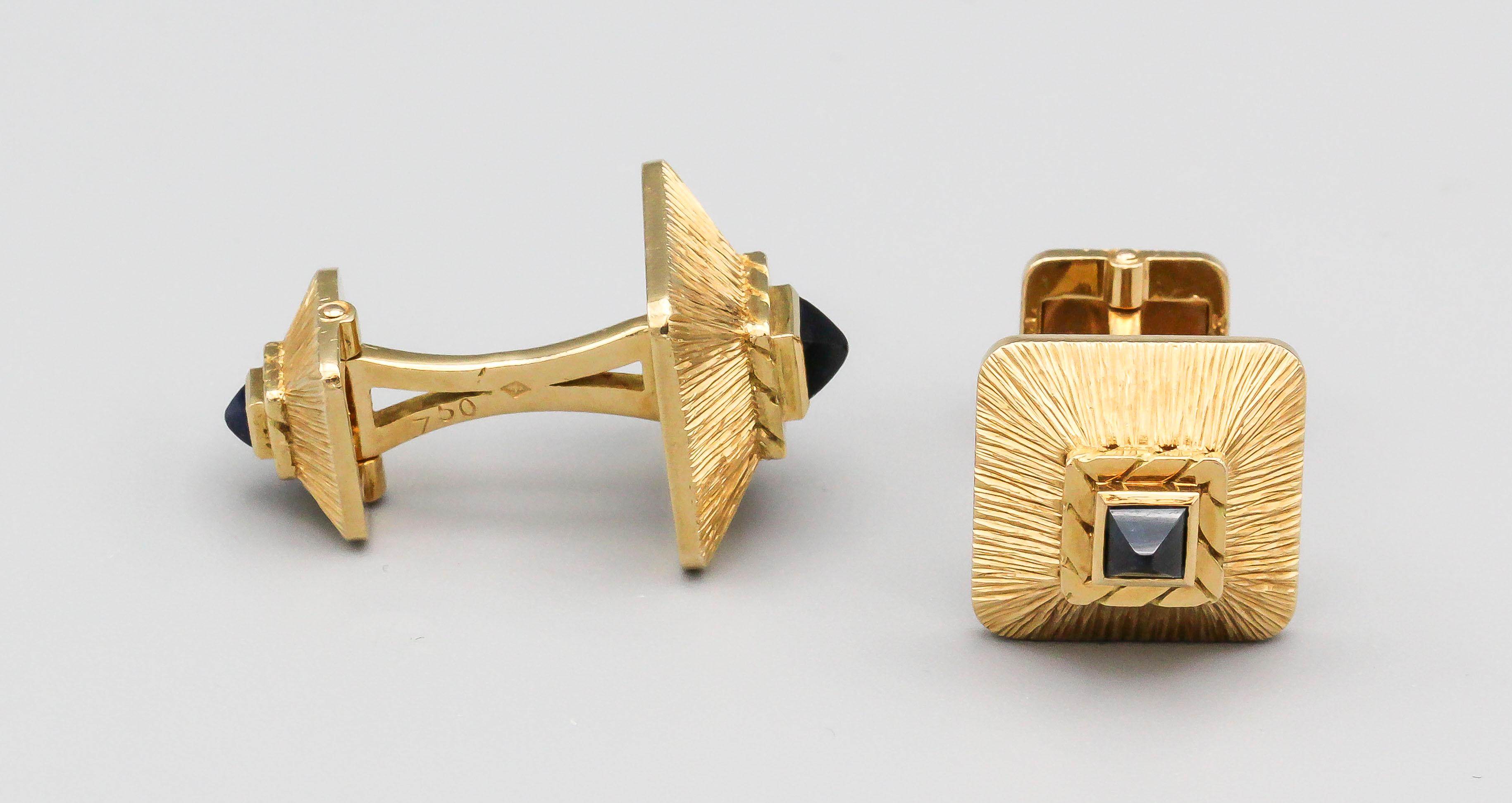 Rare and unusual 18k yellow gold and sugarloaf cabochon sapphire cufflinks by Van Cleef & Arpels, circa 1950-60s.  Of French origin.

Hallmarks:  VCA, 750, reference numbers, French 18k gold assay marks, maker's mark.