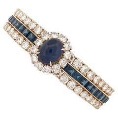 Van Cleef & Arpels Armreif aus 18 Karat Gelbgold mit Saphir und Diamant