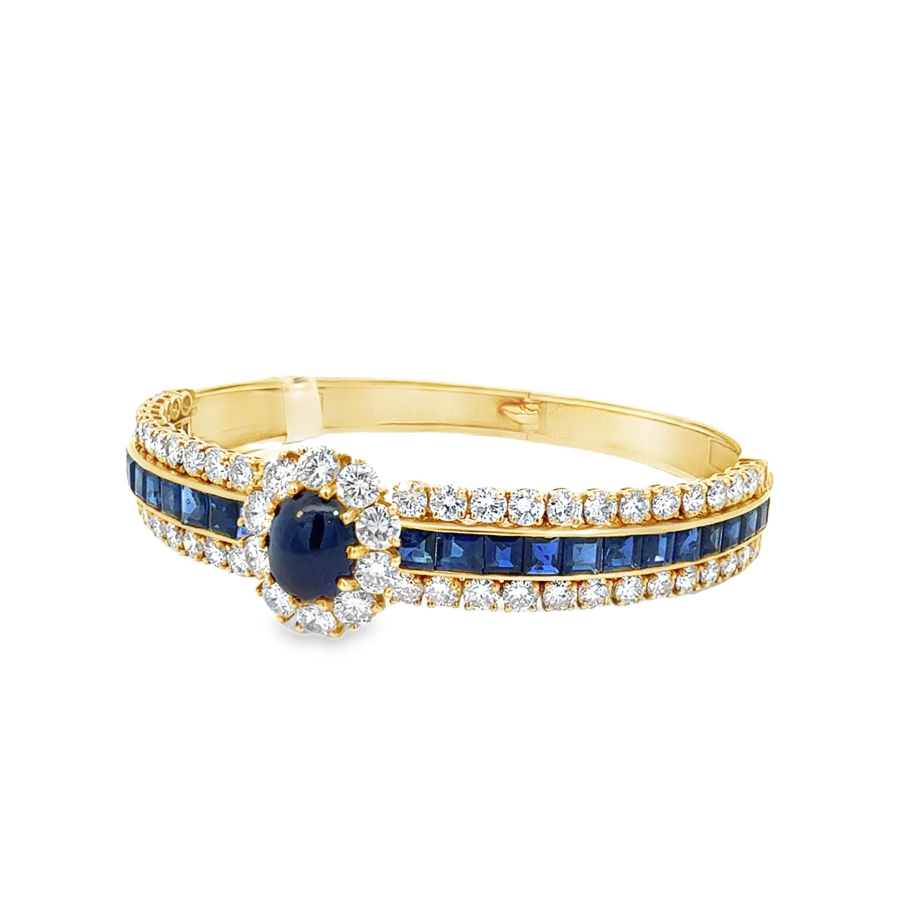 This exquisite Van Cleef & Arpels 18K yellow gold sapphire and diamond bangle bracelet is a rare vintage treasure, showcasing exceptional craftsmanship and timeless elegance. At the top, 24 royal blue carré-cut sapphires are meticulously set,