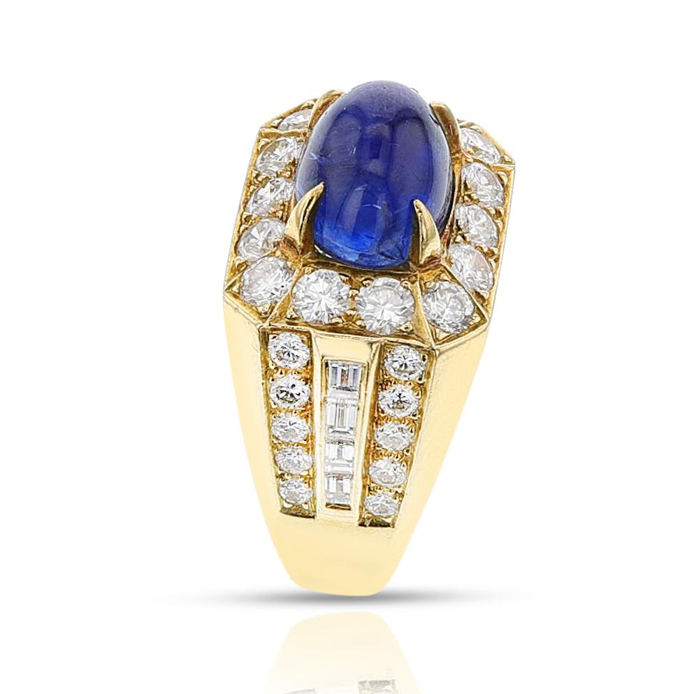 A Van Cleef & Arpels Sapphire Cabochon and Diamond Ring made in 18k yellow gold. The total weight of the ring is 14.60 grams. The Ring Size is 4 US. The dimensions of the sapphire cabochon are 10 mm x 8 mm x 7 mm. The diamonds surrounding the