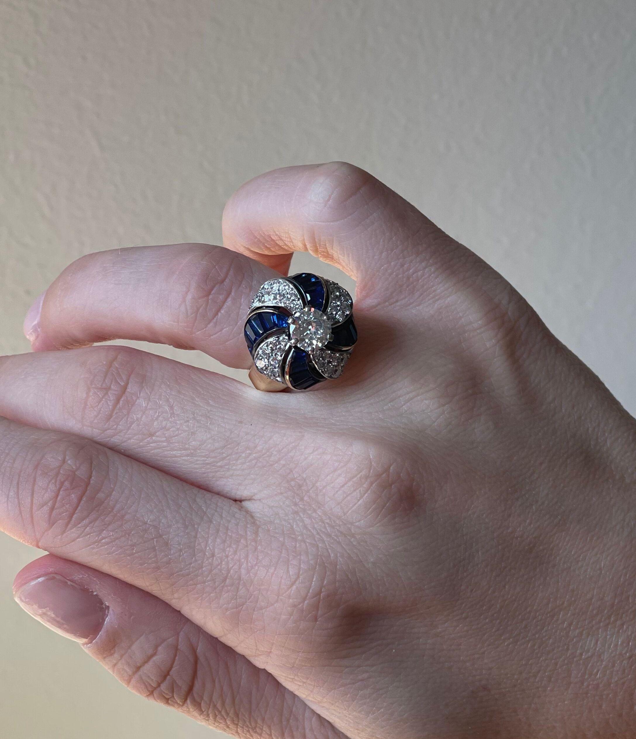 Beautiful and special 18k gold cocktail ring by Van Cleef & Arpels, featuring vibrant blue sapphires and approx. 2.20ctw in FG/VVS diamonds (center stone is approx. 1.10ct). Ring size 4.75, top is 0.75