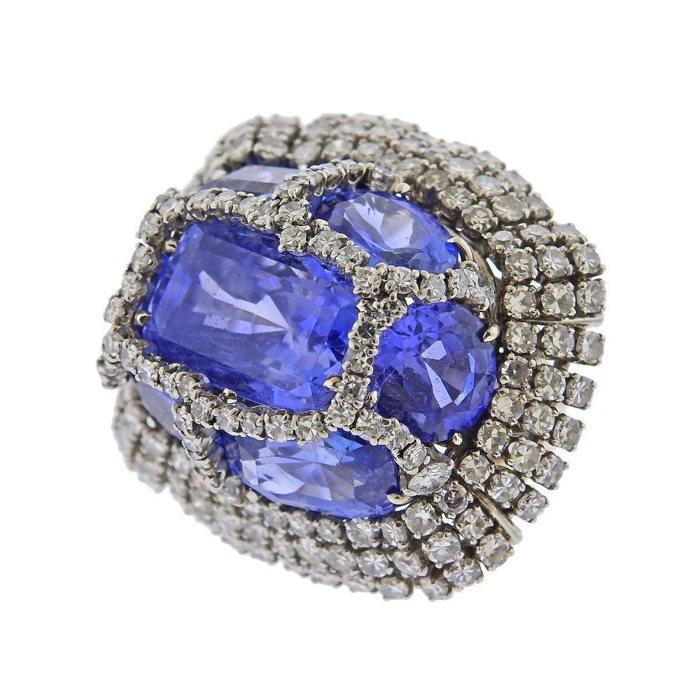 Important 18k white gold cocktail ring by Van Cleef & Arpels. Set with sapphires and approx. 7.00ctw in diamonds. Ring size - 4.75, ring top - 28mm x 33mm, sits approx. 15mm from the top of the finger. Marked: VCA, Hallmarks. Weight - 30.6