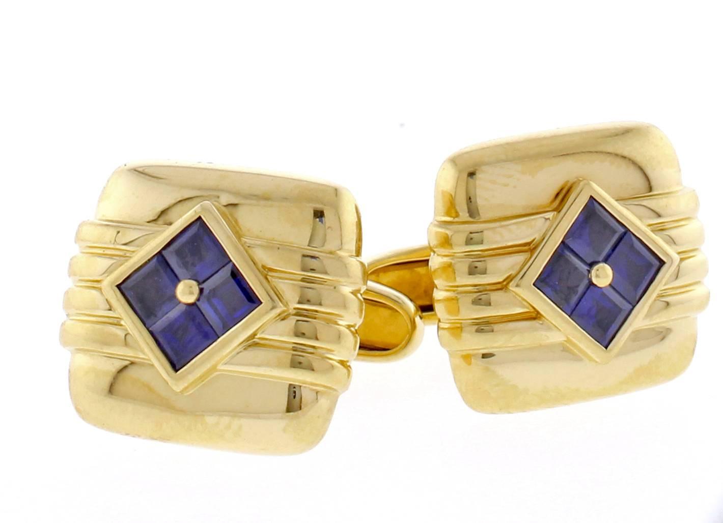 From Van Cleef & Arpels,   a distinctive pair of sapphire and gold cufflinks. The cufflinks measure 18.5mm by 16mm. Original box