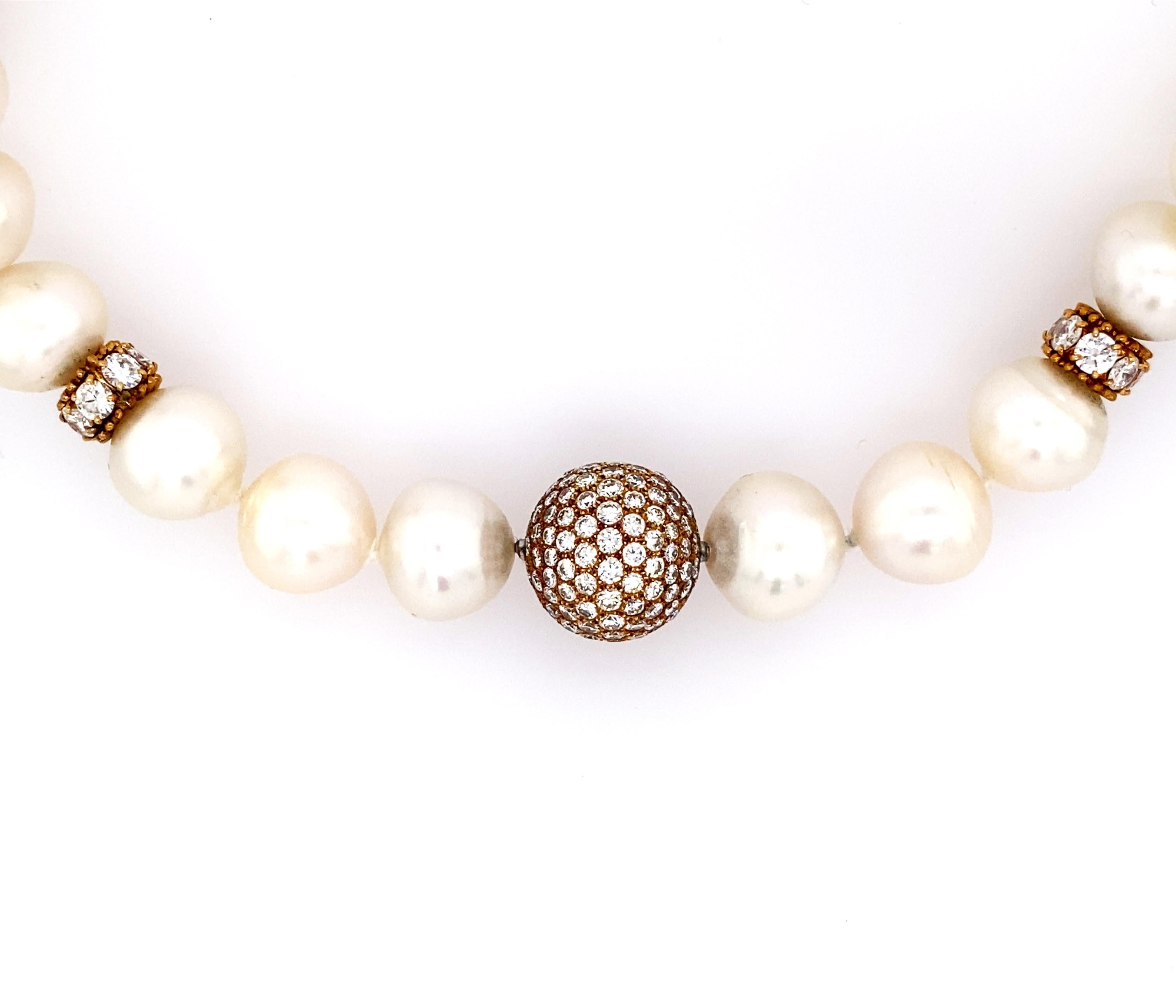 Gold, Semi-Baroque South Sea Cultured Pearl and Diamond Necklace by Van Cleef and Arpels with engraved Serial Number 55610 and certificate of authenticity. 
18k composed of 28 pearls approximately 13.8 to 11.2 mm spaced by eight gold rondelles of