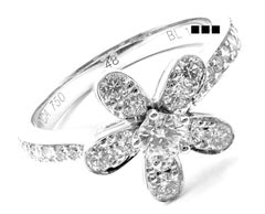 Van Cleef & Arpels Anello Socrate con diamante a un fiore in oro bianco