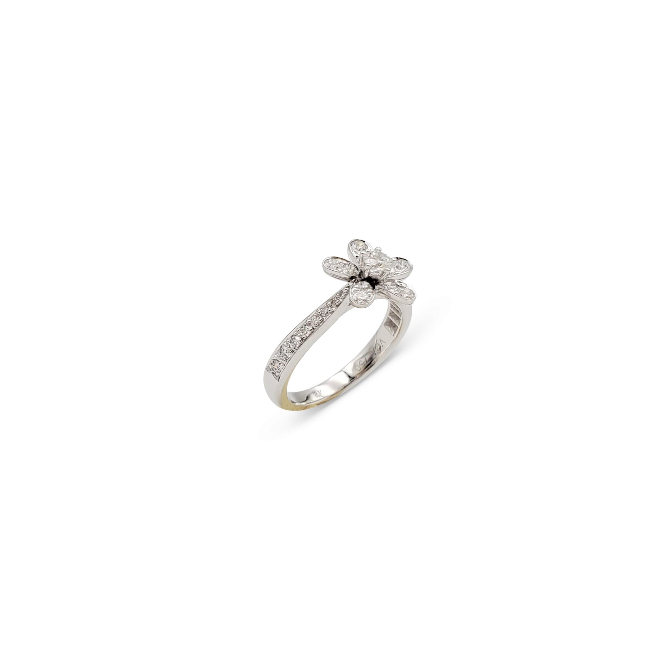 van cleef & arpels flower ring