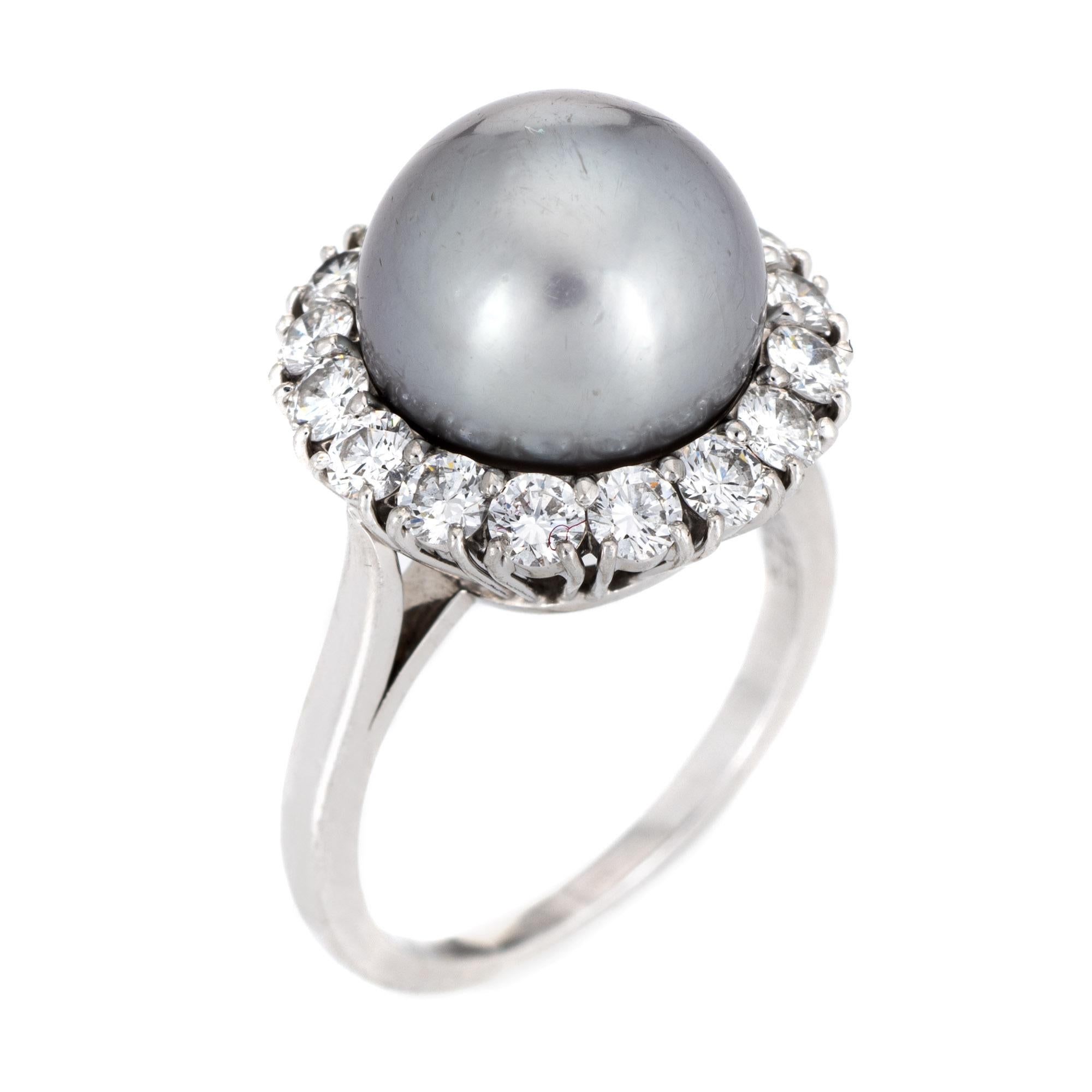 Finely detailed vintage Van Cleef & Arpels South Sea Pearl & diamond ring crafted in platinum (circa 1980s to 1990s). 

South Sea Pearl measures 11mm. 16 diamonds total an estimated 1.20 carats (estimated at E-F color and VVS2 clarity). The pearl is