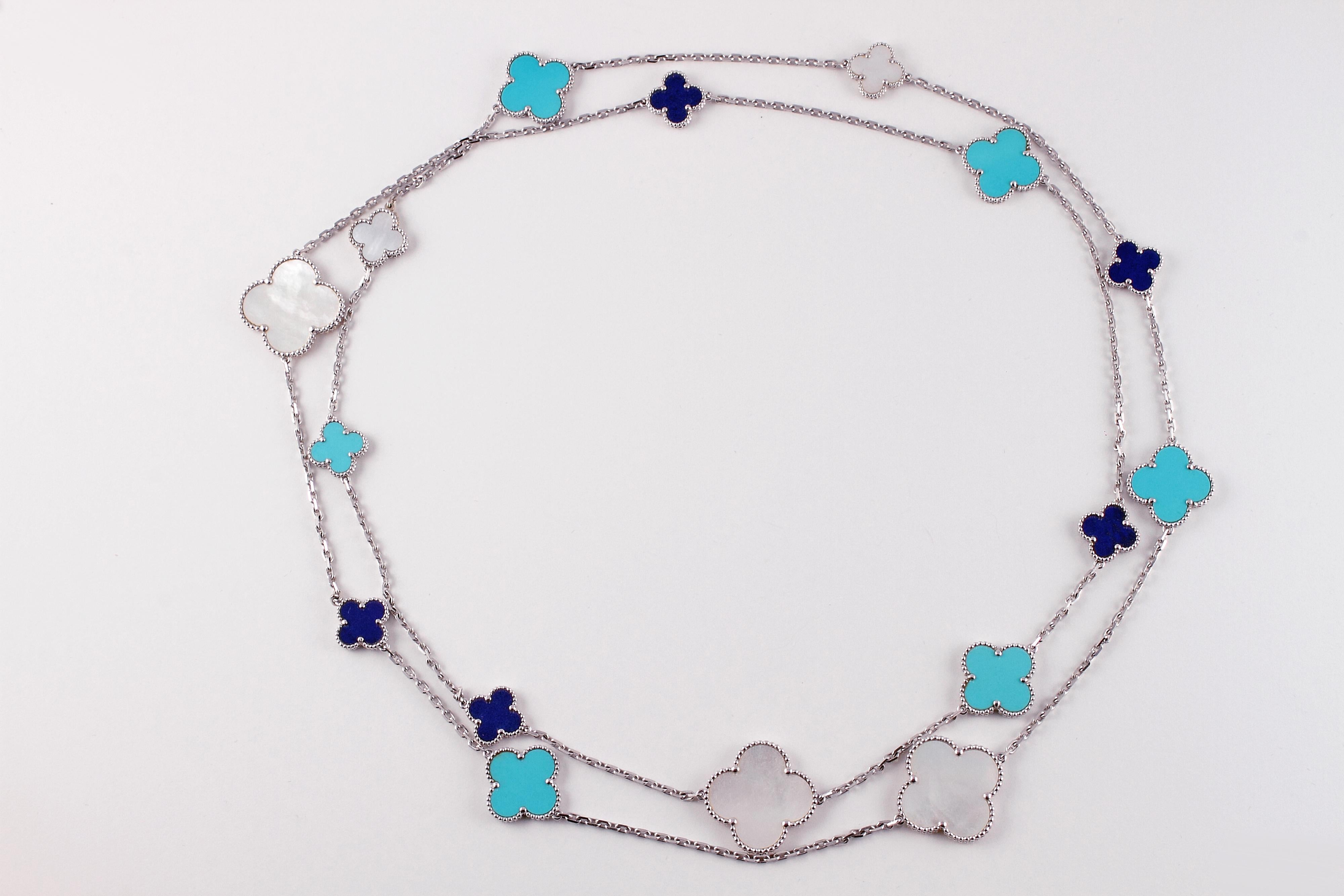No one does it quite like Van Cleef & Arpels!  This timeless beauty is in 18 karat white gold and features 16 mixed motif stations, in lapis, turquoise and mother of pearl.  The retail price of this special limited edition necklace was $31,000 in