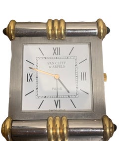 Van Cleef & Arpels Reiseuhr aus Stahl und 18 Karat Gelbgold