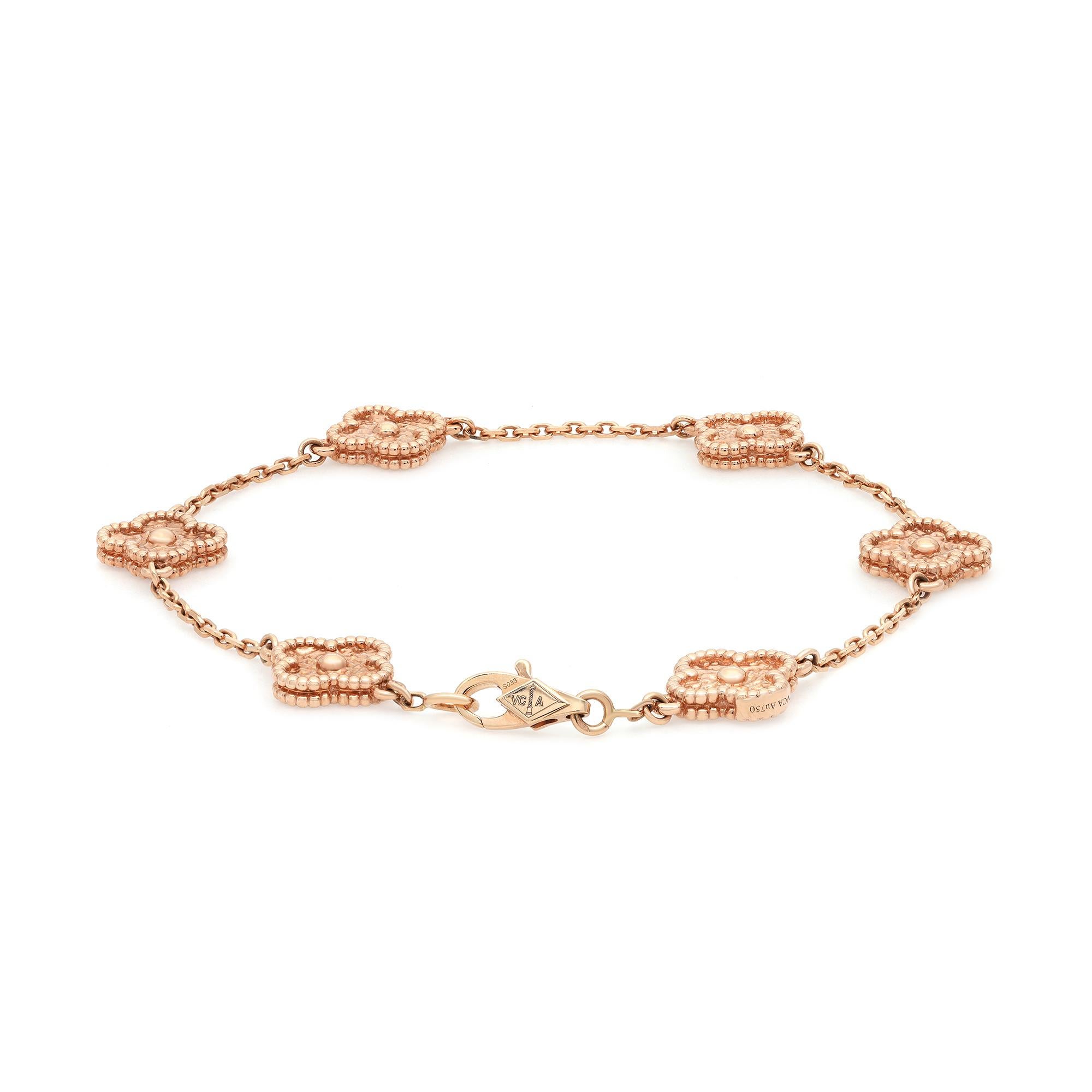 Light and delicate, this Sweet Alhambra bracelet by Van Cleef & Arpels features 6 delightful lucky motifs in miniature form. Crafted in fine 18k rose gold. Secured with hallmarked clasp. Bracelet length: 6.69 inches. Total weight: 7.5 grams.