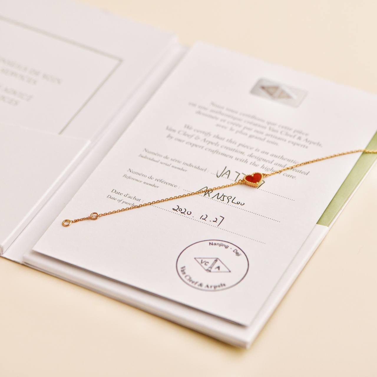 Van Cleef & Arpels Sweet Alhambra Carnelian Heart 18K Rose Gold Bracelet In Excellent Condition In Banbury, GB