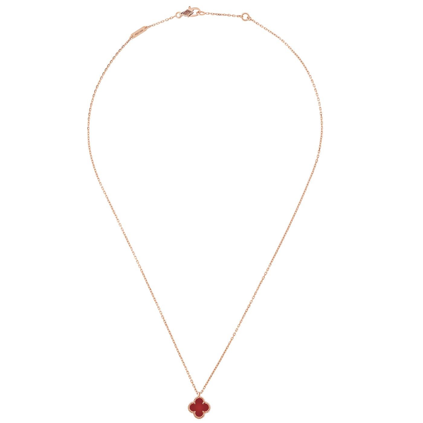 Van Cleef & Arpels Sweet Alhambra pendant, 18K rose gold, carnelian.

Details:
Brand: Van Cleef & Arpels
Type: Sweet Alhambra Pendant
Clasp: Hallmark Clasp Extra Small Model
Stones: Carnelian: 1 stone (As each stone is unique, its color and features