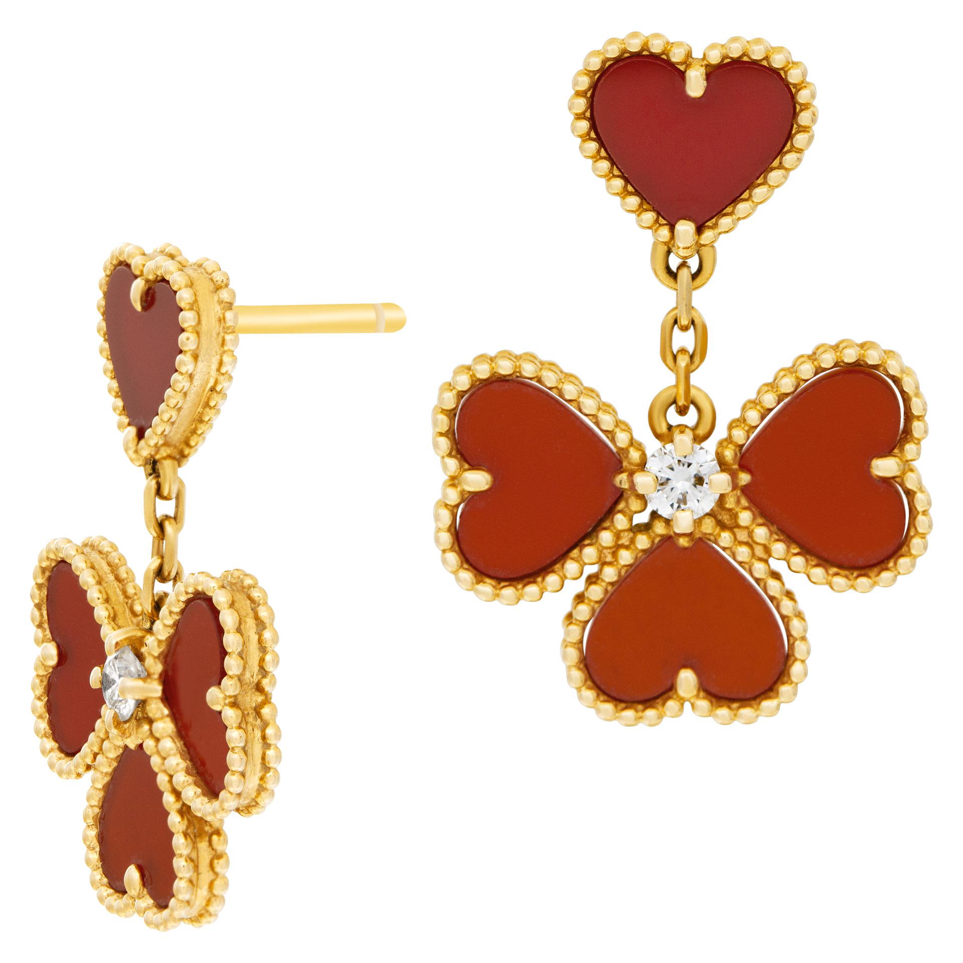 ESTIMATED RETAIL $7,000.00 - YOUR PRICE $6,300.00 - Van Cleef & Arpels Sweet Alhambra Effeuillage drop earrings featuring red carnelian stone with 0.17 carats of round brilliant cut diamonds. Drop length: 1''.