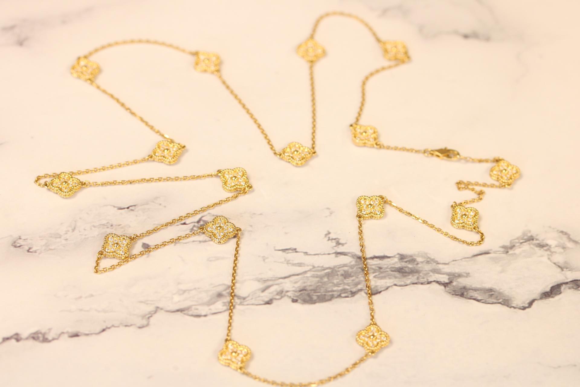 Van Cleef & Arpels Sweet Alhambra long necklace, 16 motifs Box & Papers In Excellent Condition For Sale In Great Neck Plaza, NY