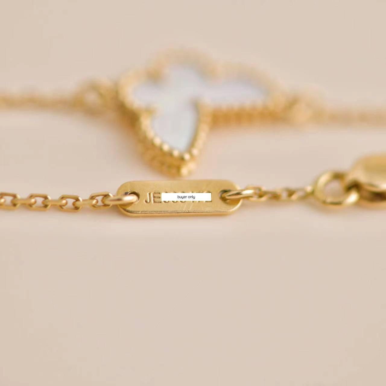 Van Cleef & Arpels Sweet Alhambra Mother-of-Pearl Butterfly Yellow Gold Bracelet In Excellent Condition In Banbury, GB