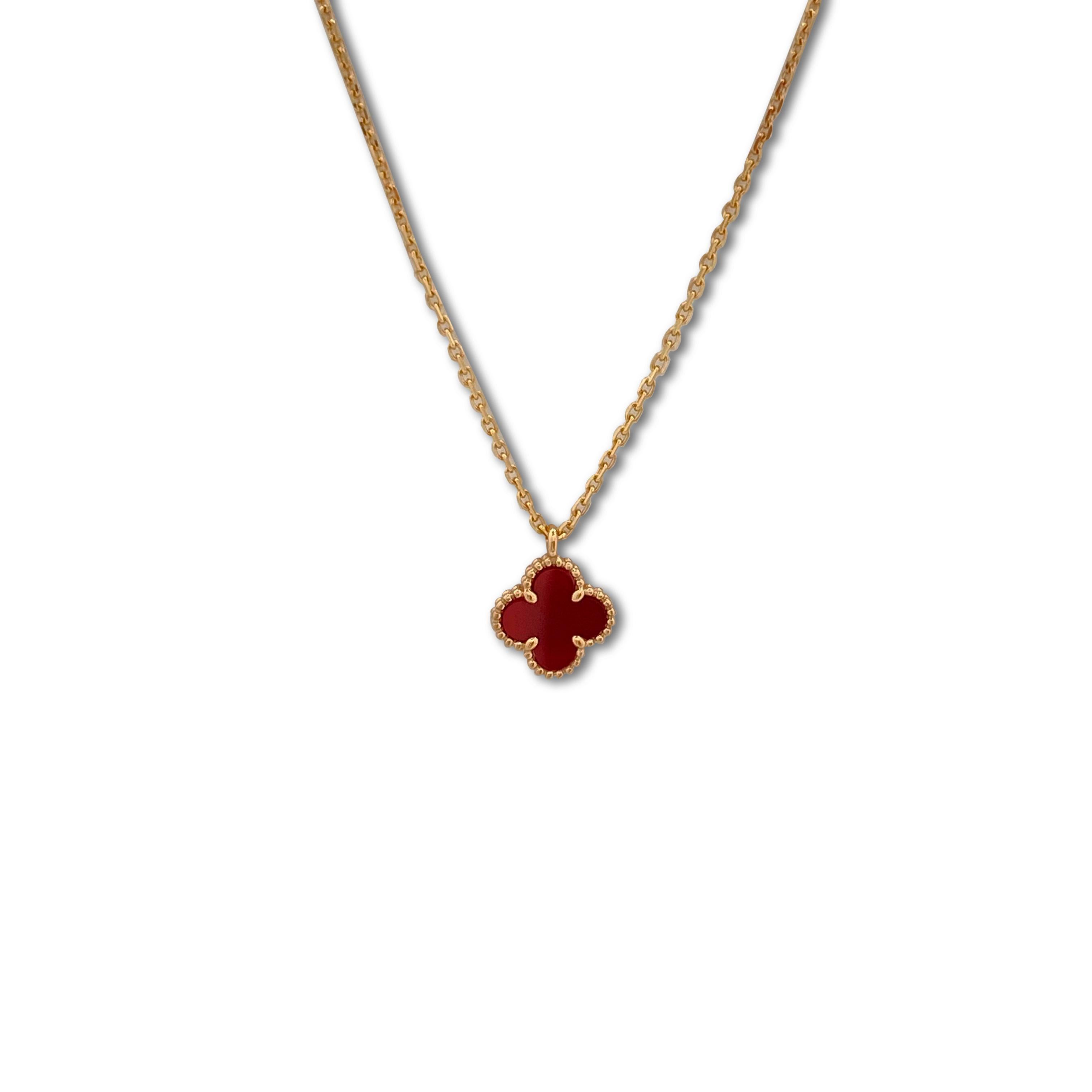 Authentic Van Cleef & Arpels Sweet Alhambra pendant necklace crafted in 18 karat rose gold and featuring a single clover-inspired motif pendant in carnelian. The necklace measures 16.25 inches in total length with an adjustable chain. The pendant